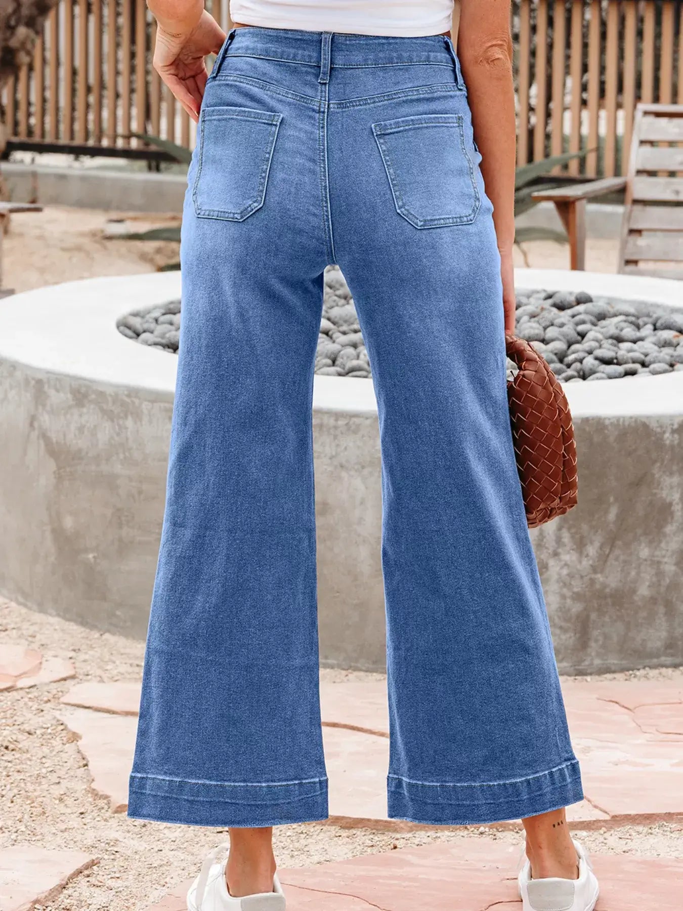 Back view of High-Waisted Wide Leg Flare Jeans showcasing their flattering fit and vintage-inspired style.