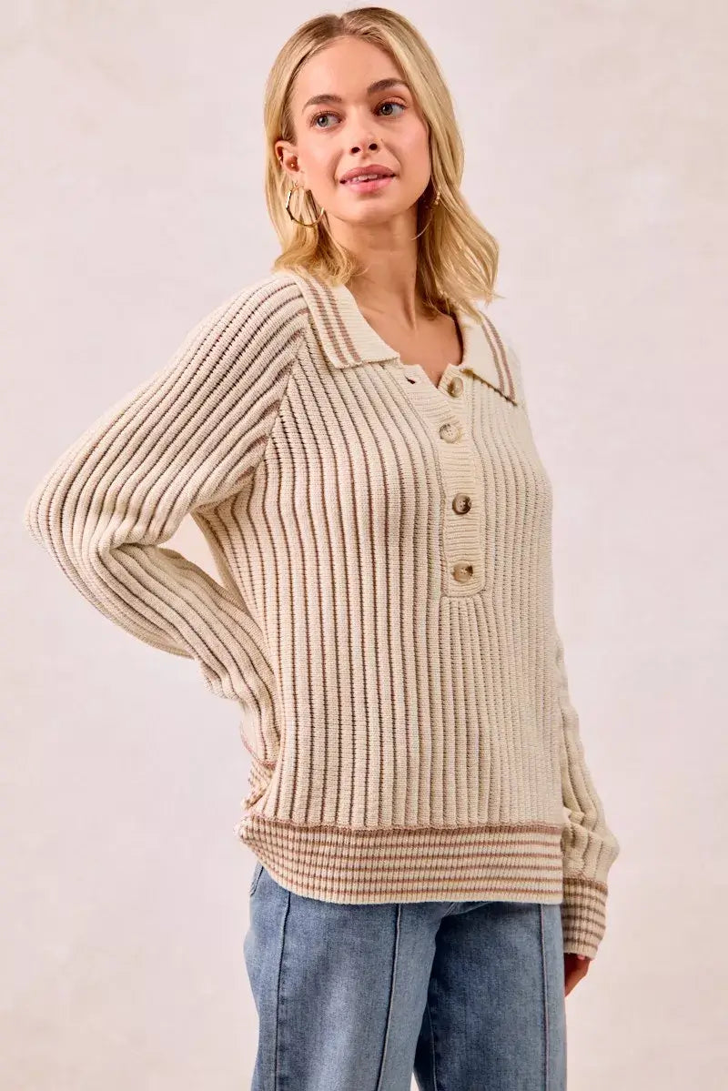 BiBi half button ribbed two tone sweater in cream, showcasing a relaxed fit and stylish ribbed design.