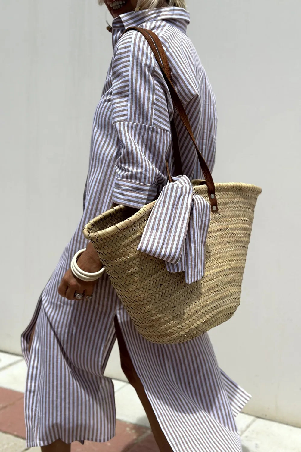 Tied Button Up Three-Quarter Sleeve Dress with a stylish woven bag, perfect for casual outings.