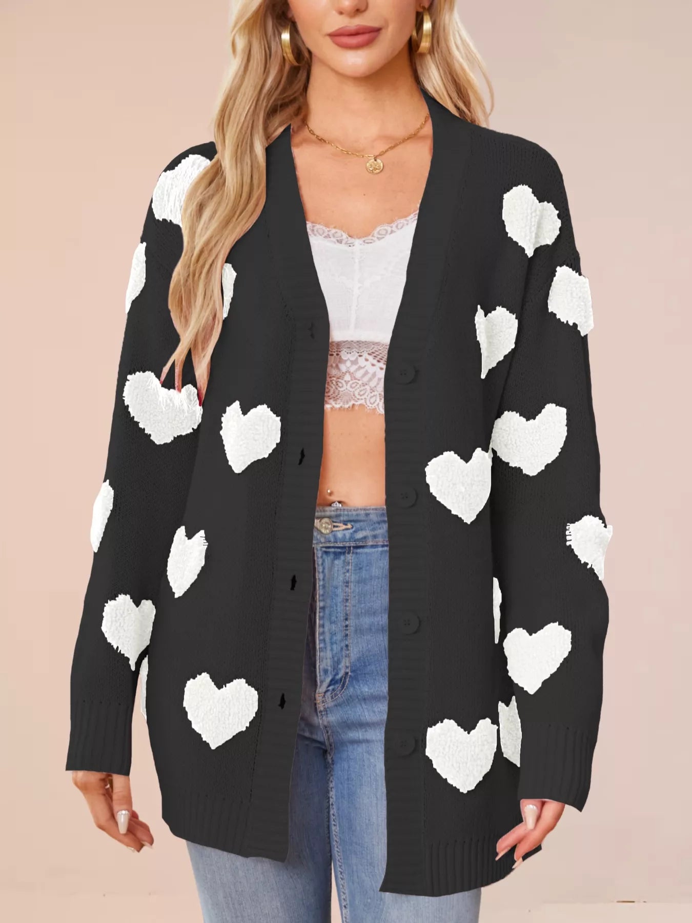Heart Pattern Knit Button Up Cardigan for Women displayed on model, featuring ribbed texture and buttoned front.
