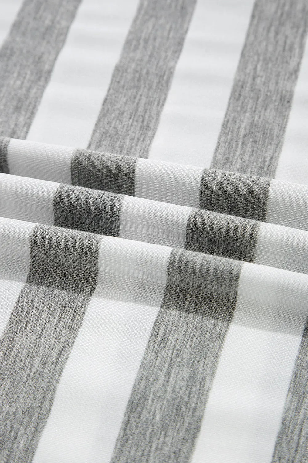 Close-up of casual striped fabric in gray and white, highlighting texture for Casual Striped V-Neck Midi T-Shirt Dress.