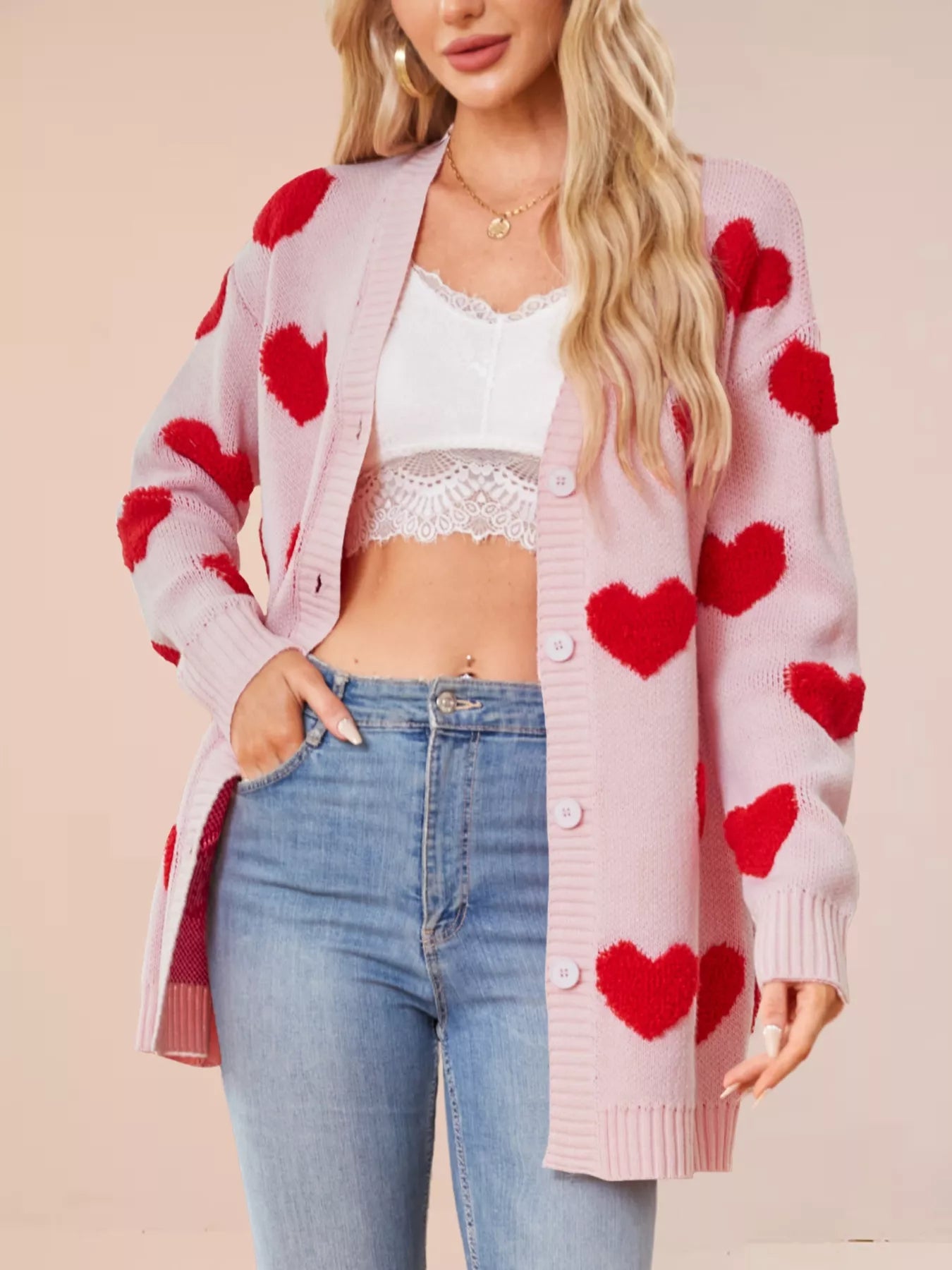 Heart Pattern Knit Button Up Cardigan for Women, featuring ribbed design and button closure, stylishly worn with jeans.