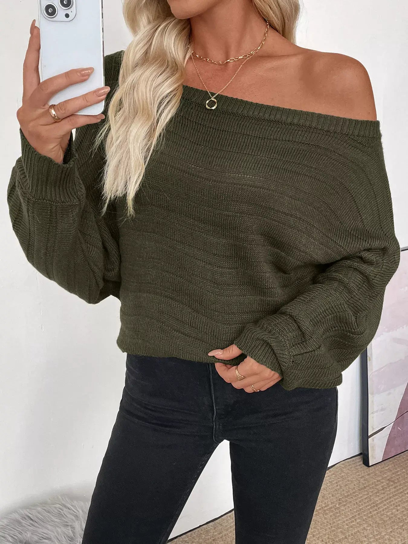 Woman wearing a Boat Neck Ribbed Long Sleeve Sweater in olive green, showcasing chic everyday style.