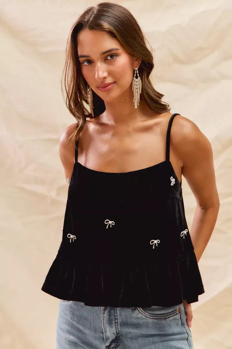 SO ME Holiday Velvet Ribbon Rhinestone Christmas Top worn by model, featuring elegant velvet fabric and rhinestone accents.