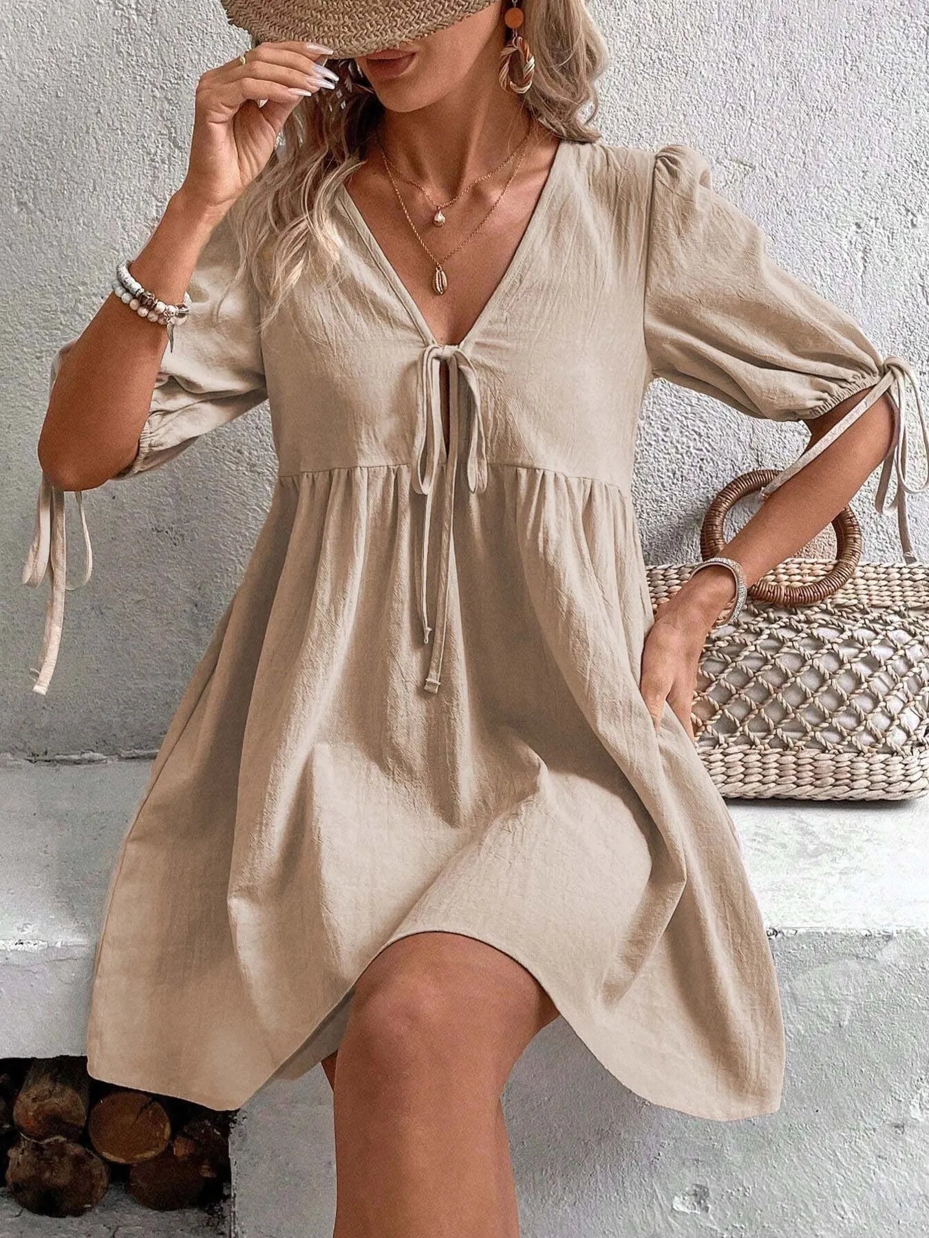 V-Neck Tie-Front Mini Dress with Puff Sleeves in beige, featuring a tied front and relaxed fit.