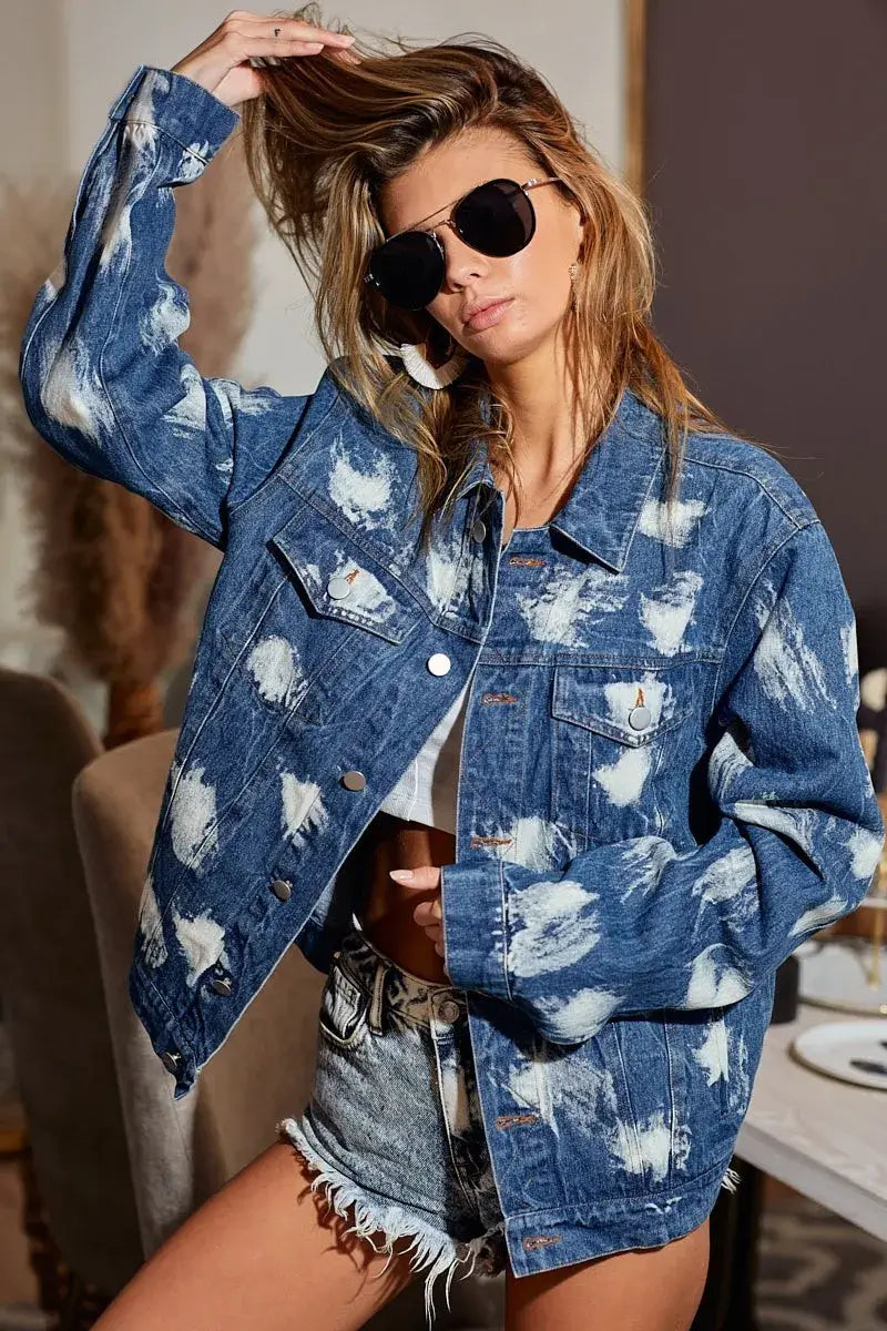 Woman wearing BiBi Washed Tie Dye Denim Jacket with oversized style and sunglasses, showcasing trendy fashion.