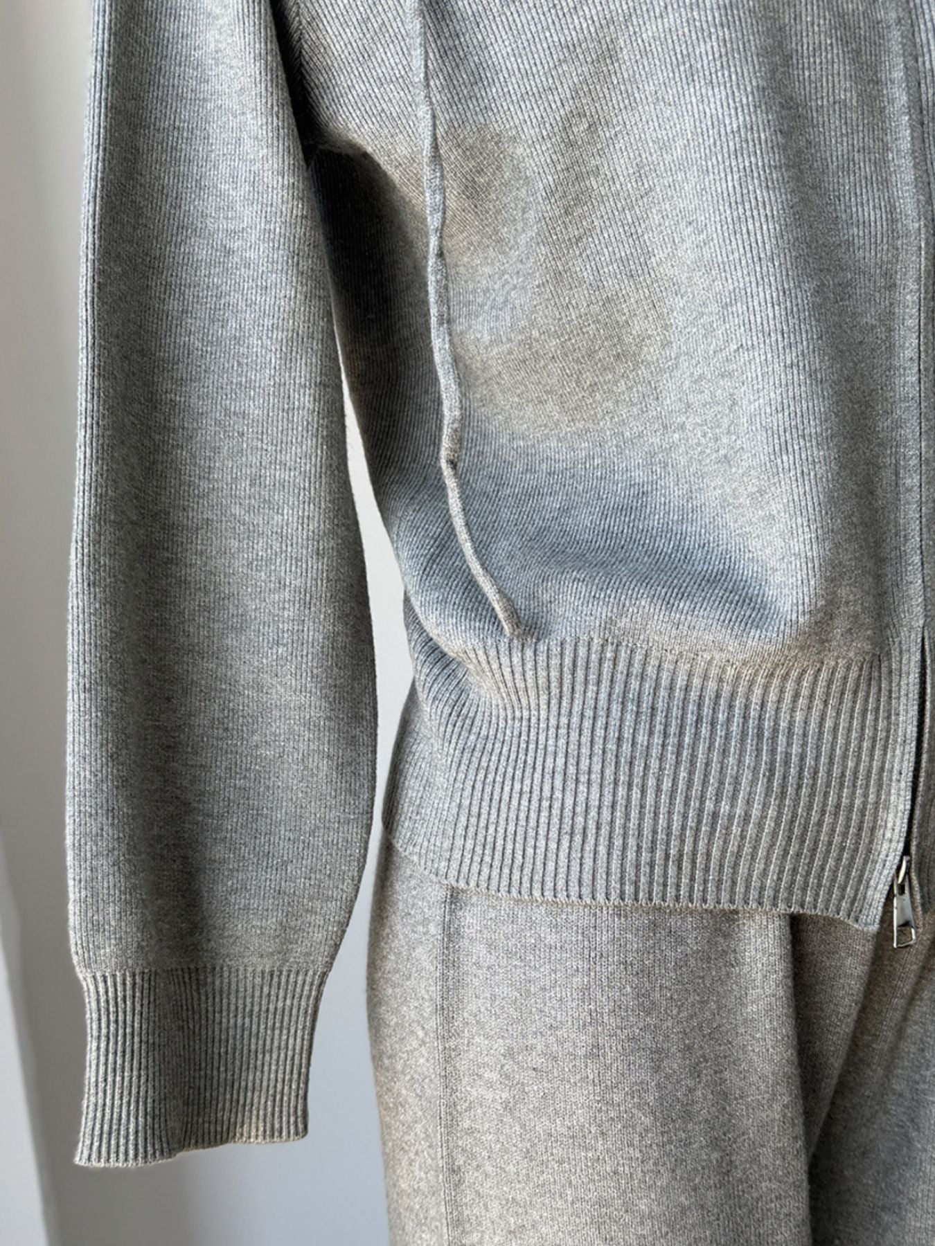 Close-up of the Zip Up Cardigan and Wide Leg Pants Knit Set showing the ribbed cuffs and zipper detail.