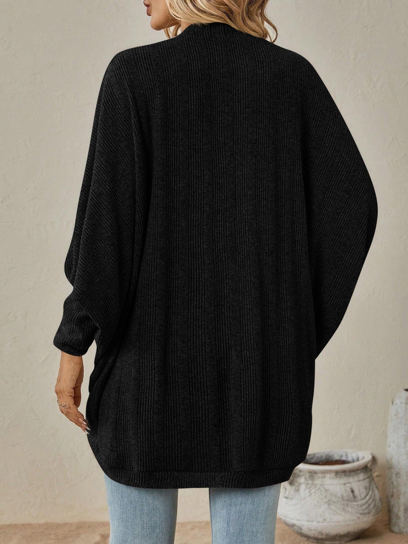 Back view of an Open Front Batwing Sleeve Cardigan in black, showcasing its lightweight, slightly stretchy design.