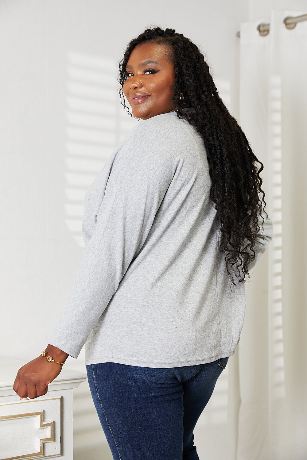 Double Take Seam Detail Round Neck Long Sleeve Top for Women in gray, stylishly showcased from the back.