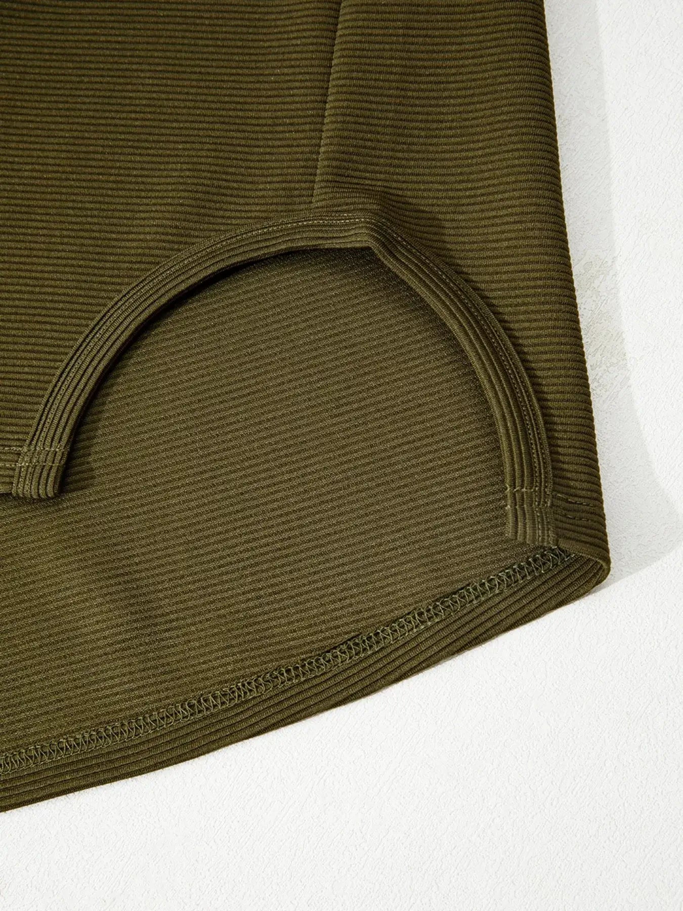 Close-up of the ribbed knit texture and cuff of the Ribbed Knit Oversized Sweatshirt.
