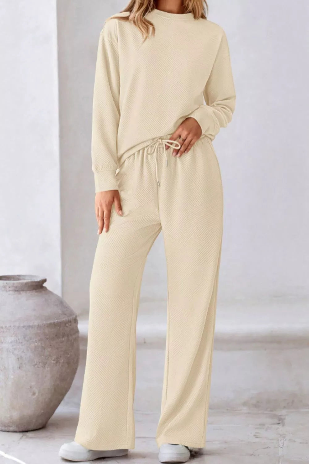 Round Neck Long Sleeve Top and Pants Set in beige, featuring a round neckline, drawstring waist pants, perfect for casual wear.