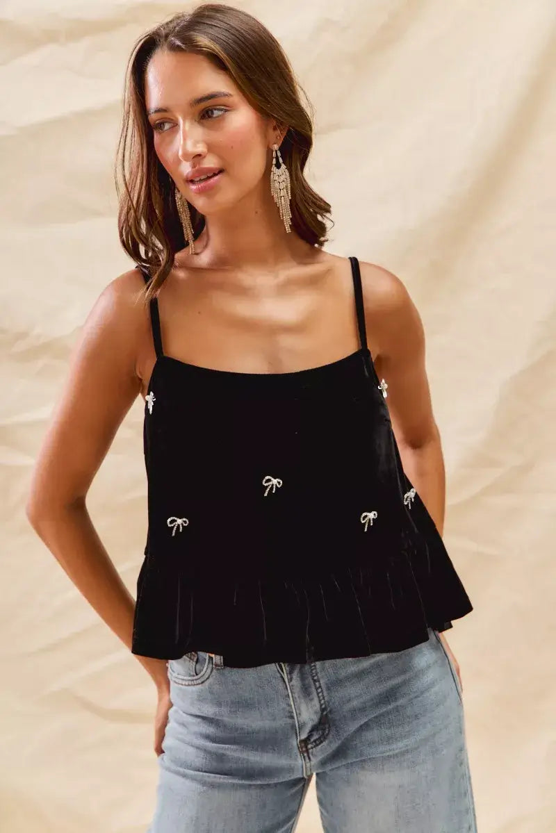 SO ME Holiday Velvet Ribbon Rhinestone Christmas Top featuring rhinestone details and velvet fabric, perfect for festive occasions.