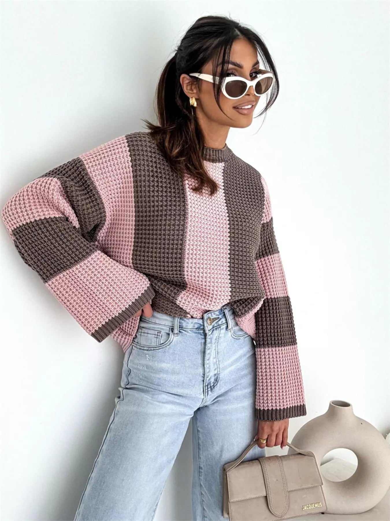 Color Block Long Sleeve Sweater – Oversized Cozy Knit Style in pink and brown worn with jeans and accessories.