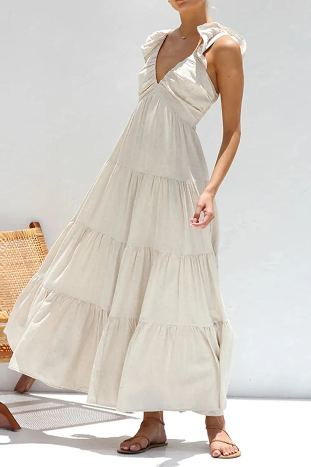 Ruffled V-Neck Tiered Dress in beige featuring ruffled straps and tiered design, perfect for summer occasions.