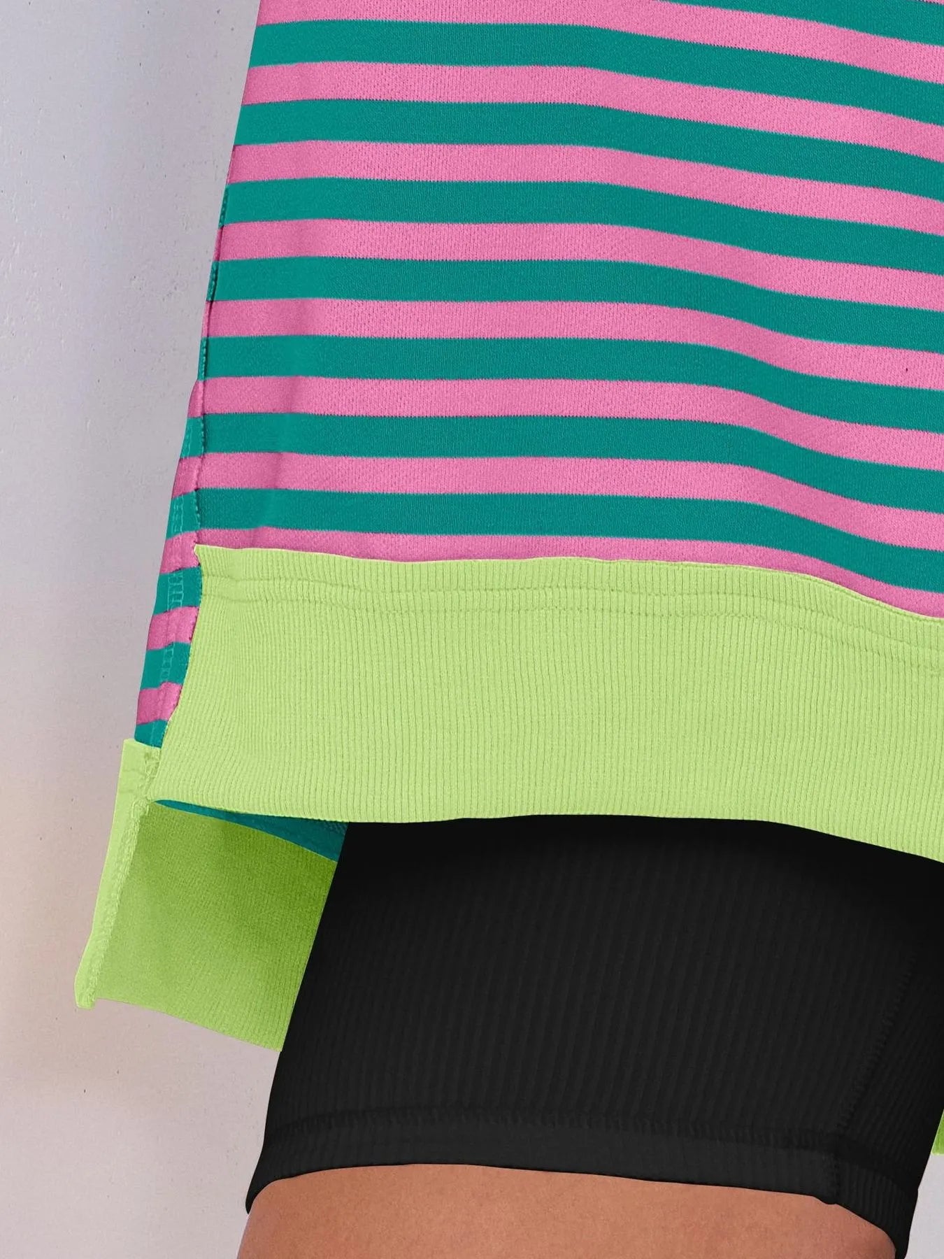 Notched Long Sleeve Oversized Sweatshirt featuring pink and green stripes with a contrasting hem.