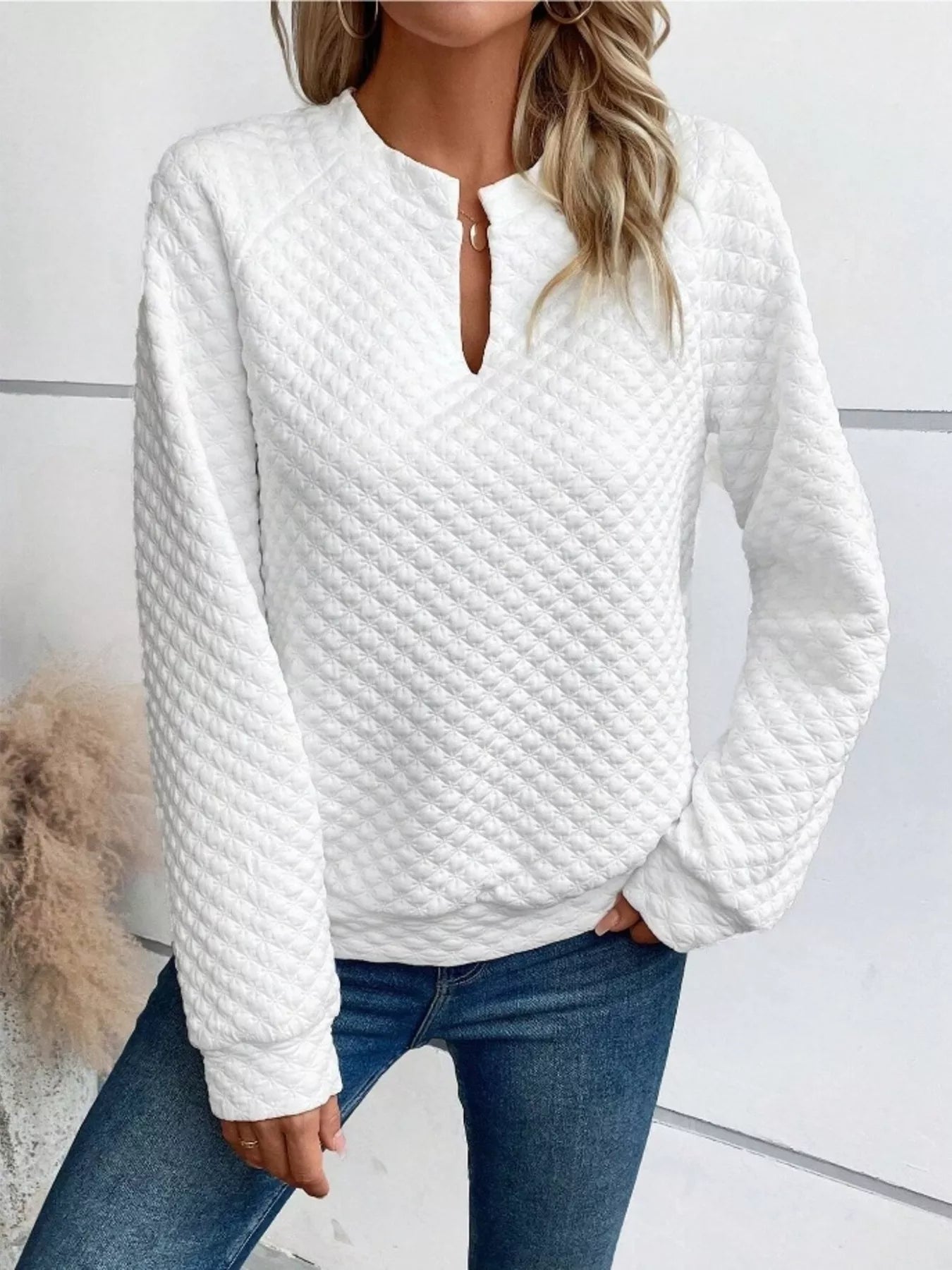 Quilted Texture Long Sleeve Sweatshirt with Notched Neck in white, featuring a textured fabric and casual style.
