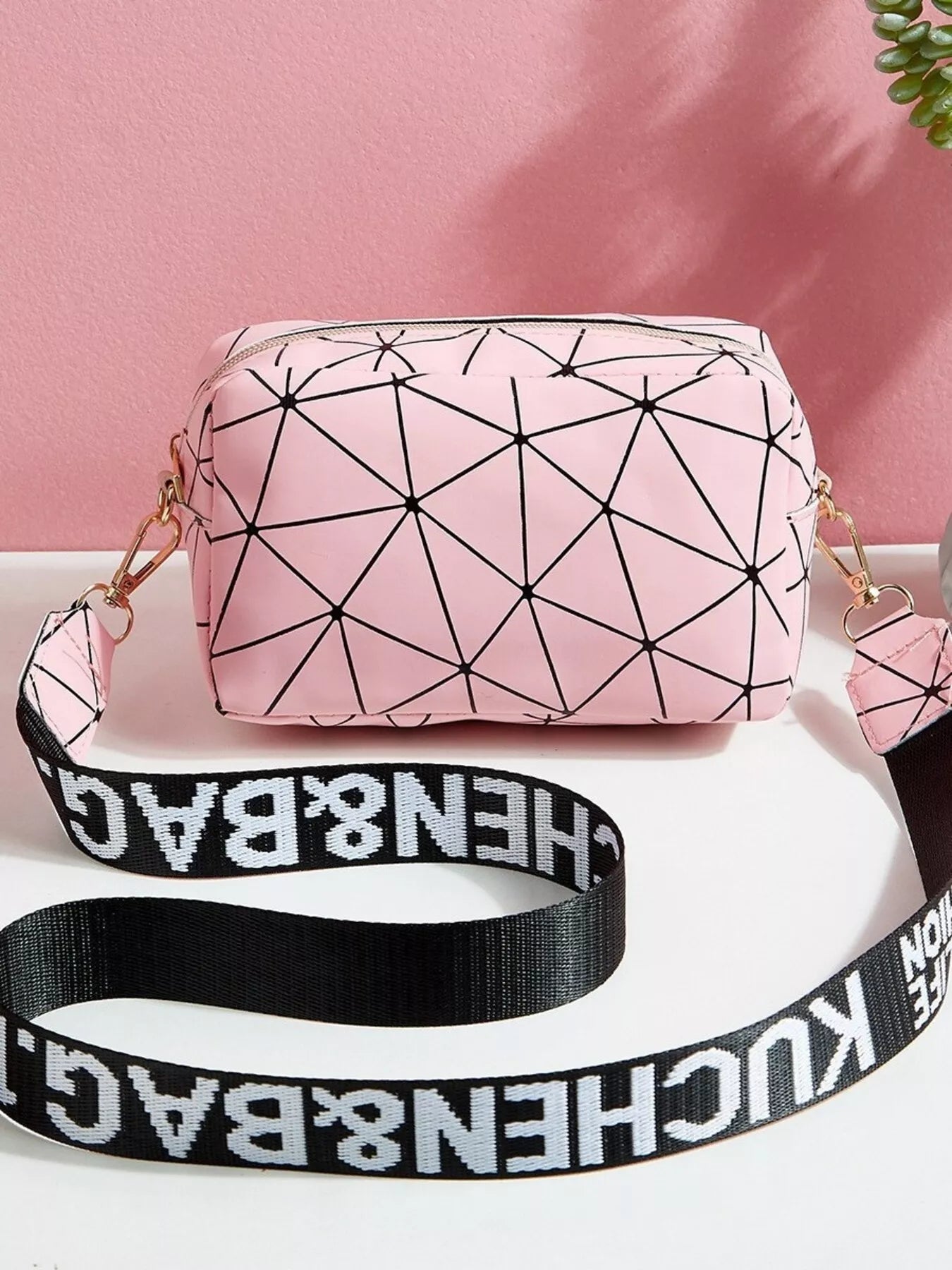 Geometric Pattern Crossbody Bag in pink PU leather with a stylish strap for modern everyday use.