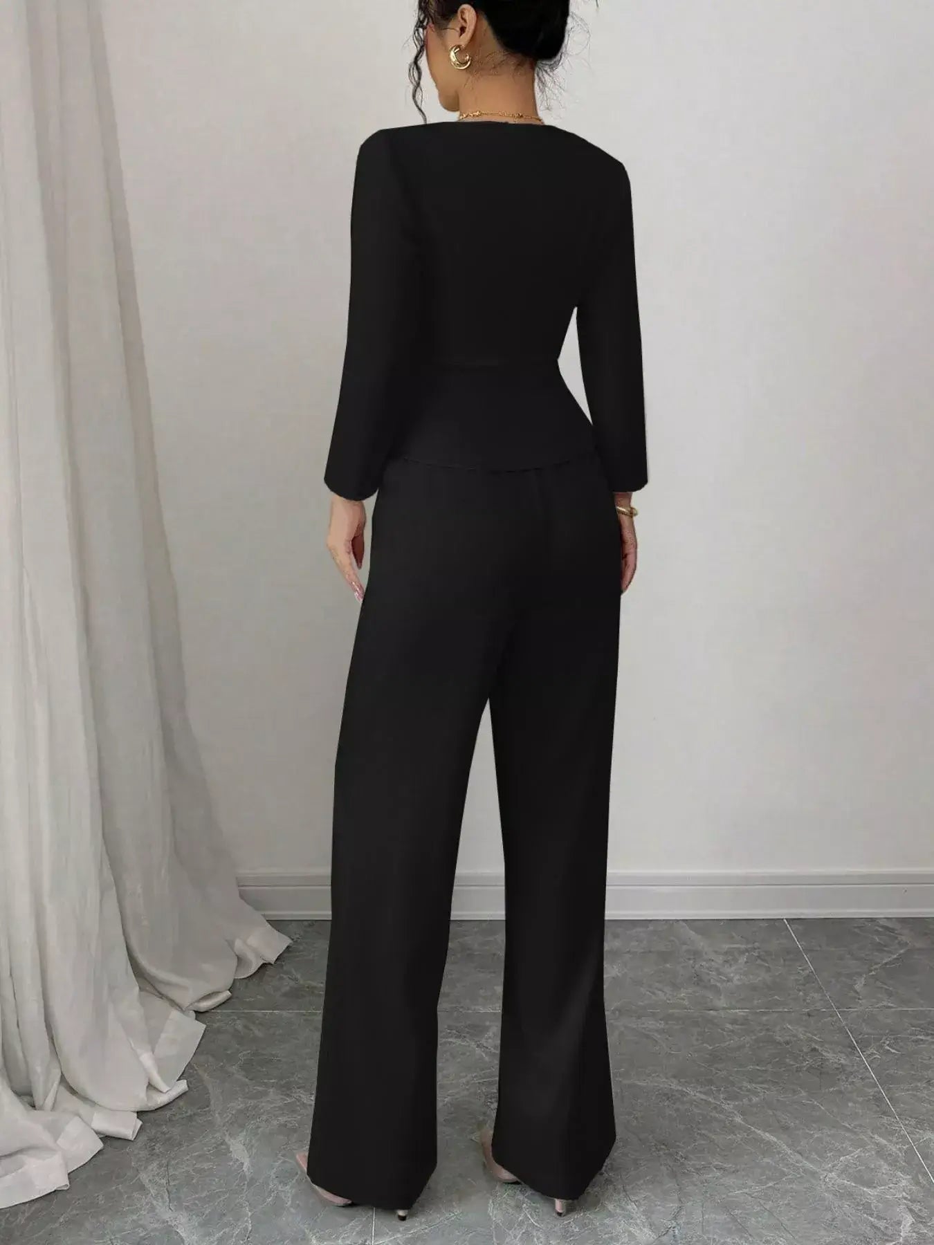 Button Up Long Sleeve Top and Pants Set shown from the back, featuring a sleek black design and tailored fit.