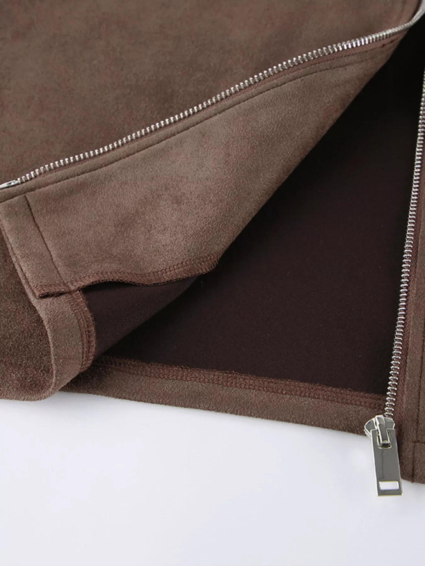 Interior view of the Zip-Up Dropped Shoulder Jacket showing the lining and zipper detail.