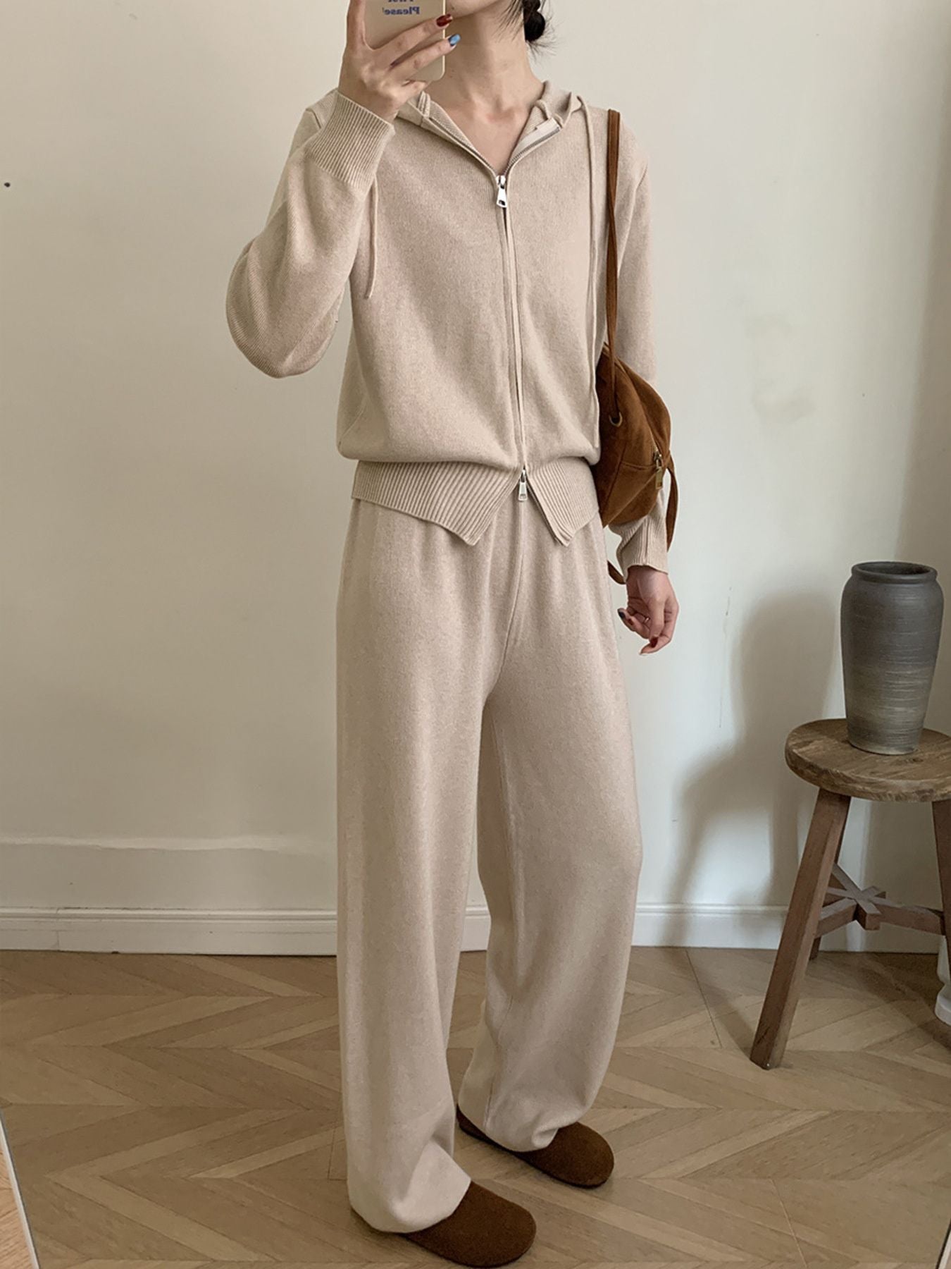 Model wearing a Zip Up Cardigan and Wide Leg Pants Knit Set in beige, showcasing a cozy two-piece outfit.