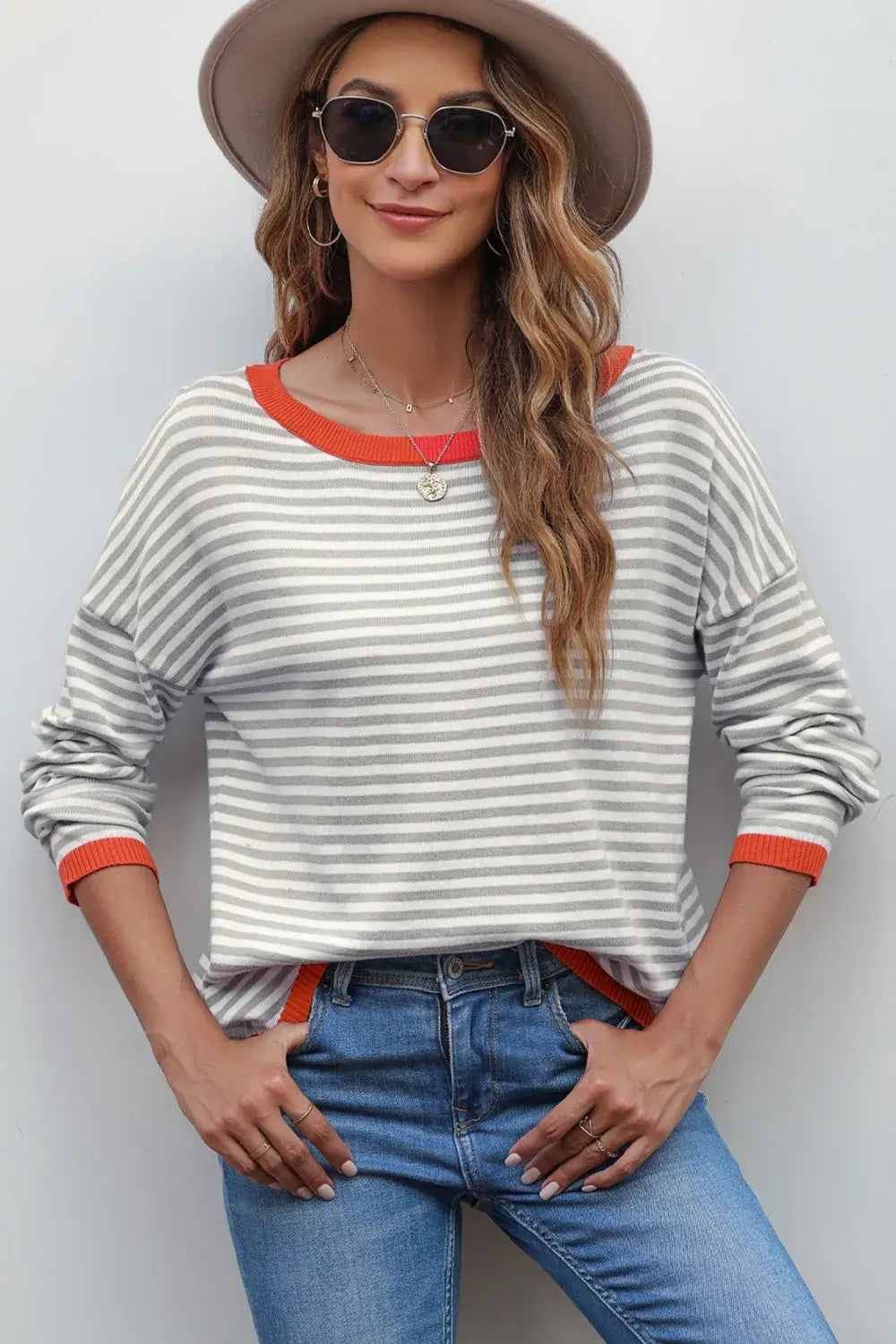 Striped Round Neck Drop Shoulder T-Shirt featuring horizontal stripes, relaxed fit, and stylish accessories.