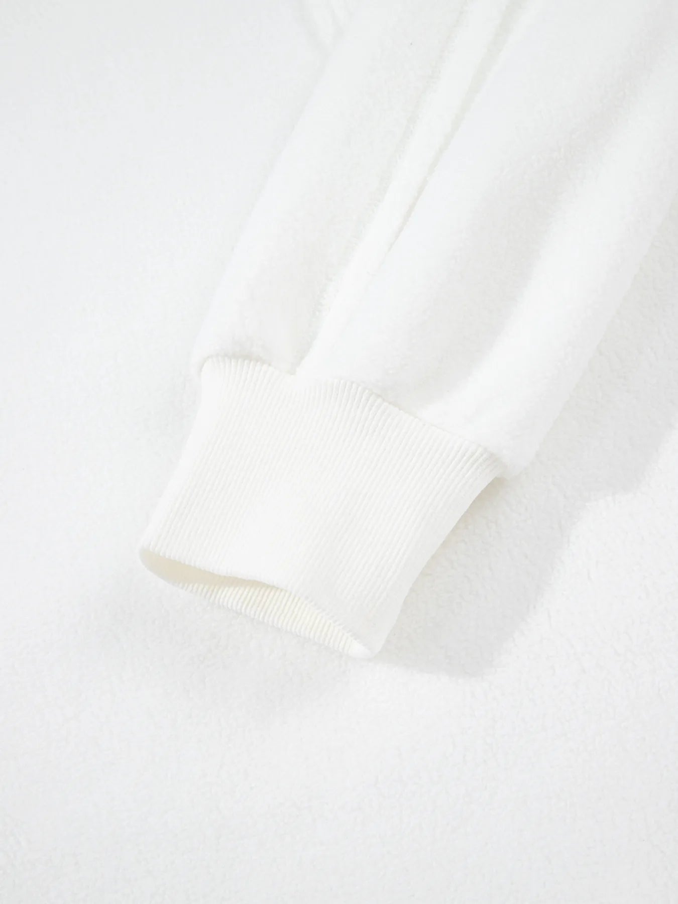 Exposed Seam Chest Pocket Knit Pullover Sweatshirt white cuff detail and texture