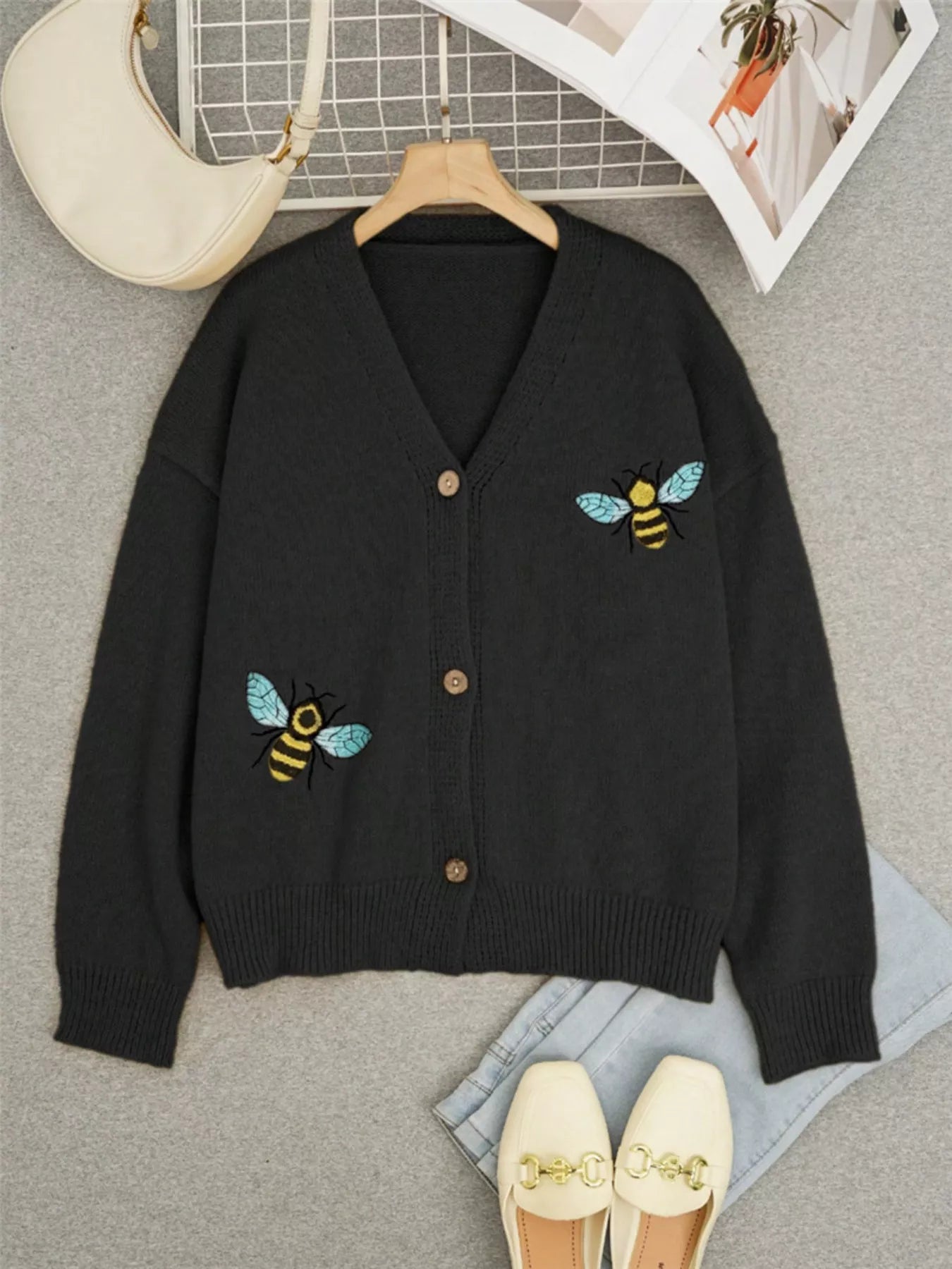 Bee Embroidered Button-Down Cardigan featuring embroidered bees on a dark background, perfect for elegant everyday wear.
