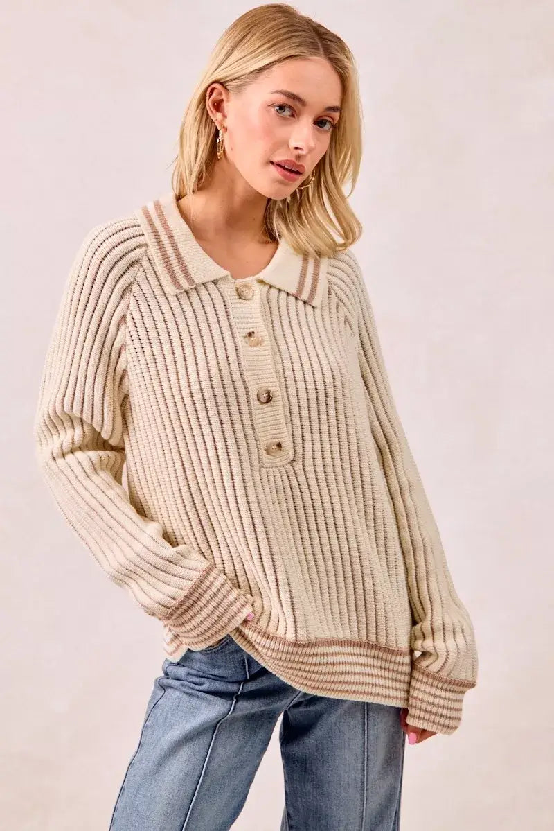 BiBi Half Button Ribbed Two Tone Sweater in cream, featuring ribbed texture and button detail for casual style.