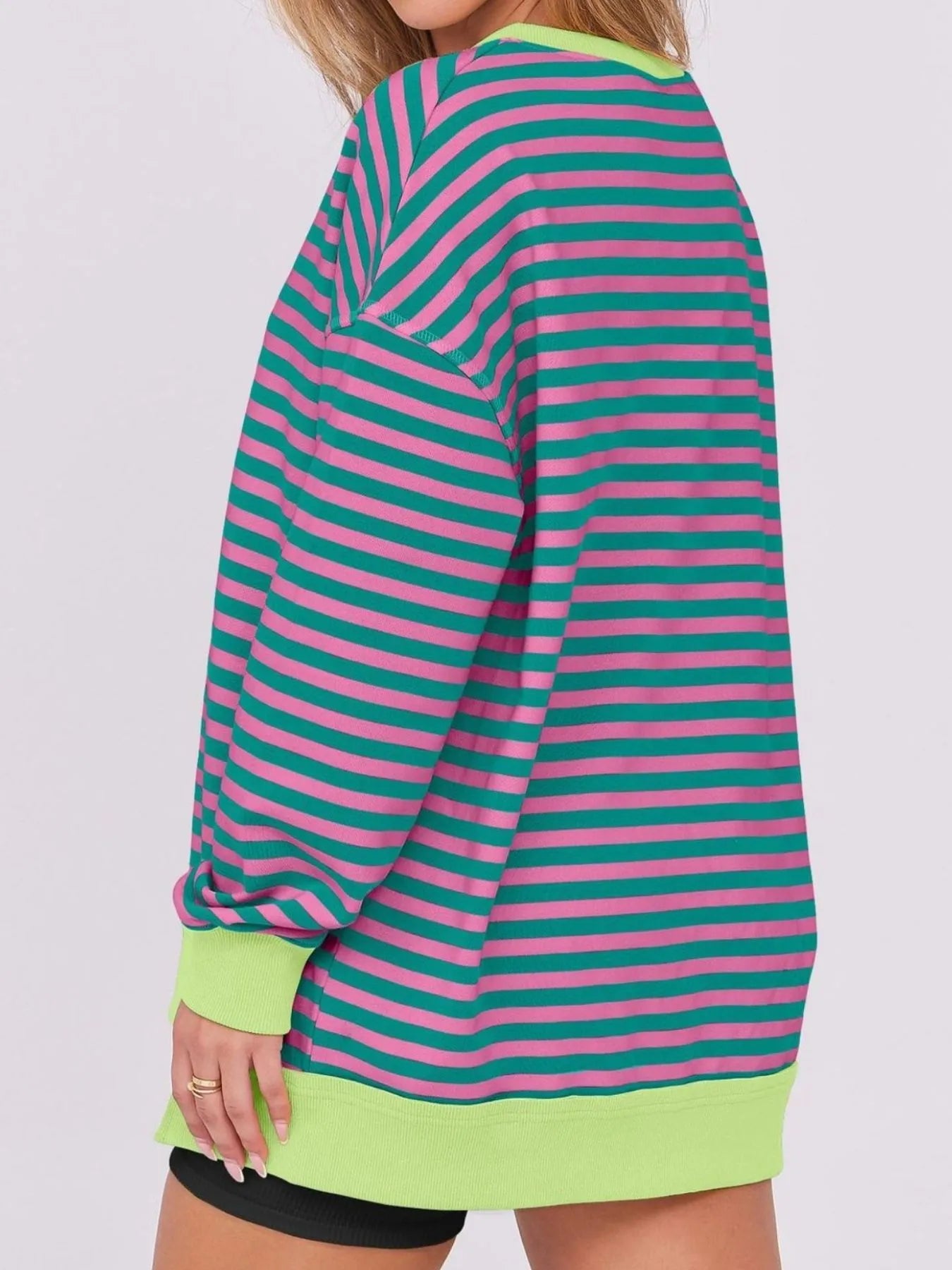 Notched Long Sleeve Oversized Sweatshirt displayed in vibrant pink and green stripes, perfect for casual wear.
