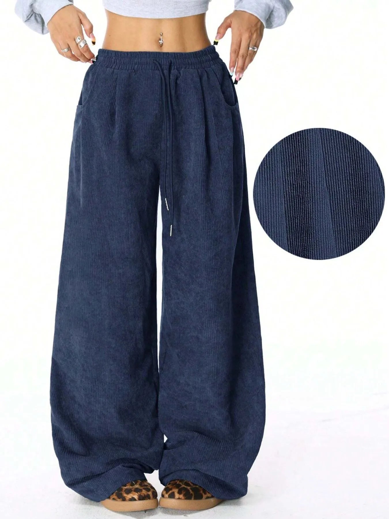 Drawstring Wide Leg Pants in navy blue, featuring pockets and a comfortable, relaxed fit.