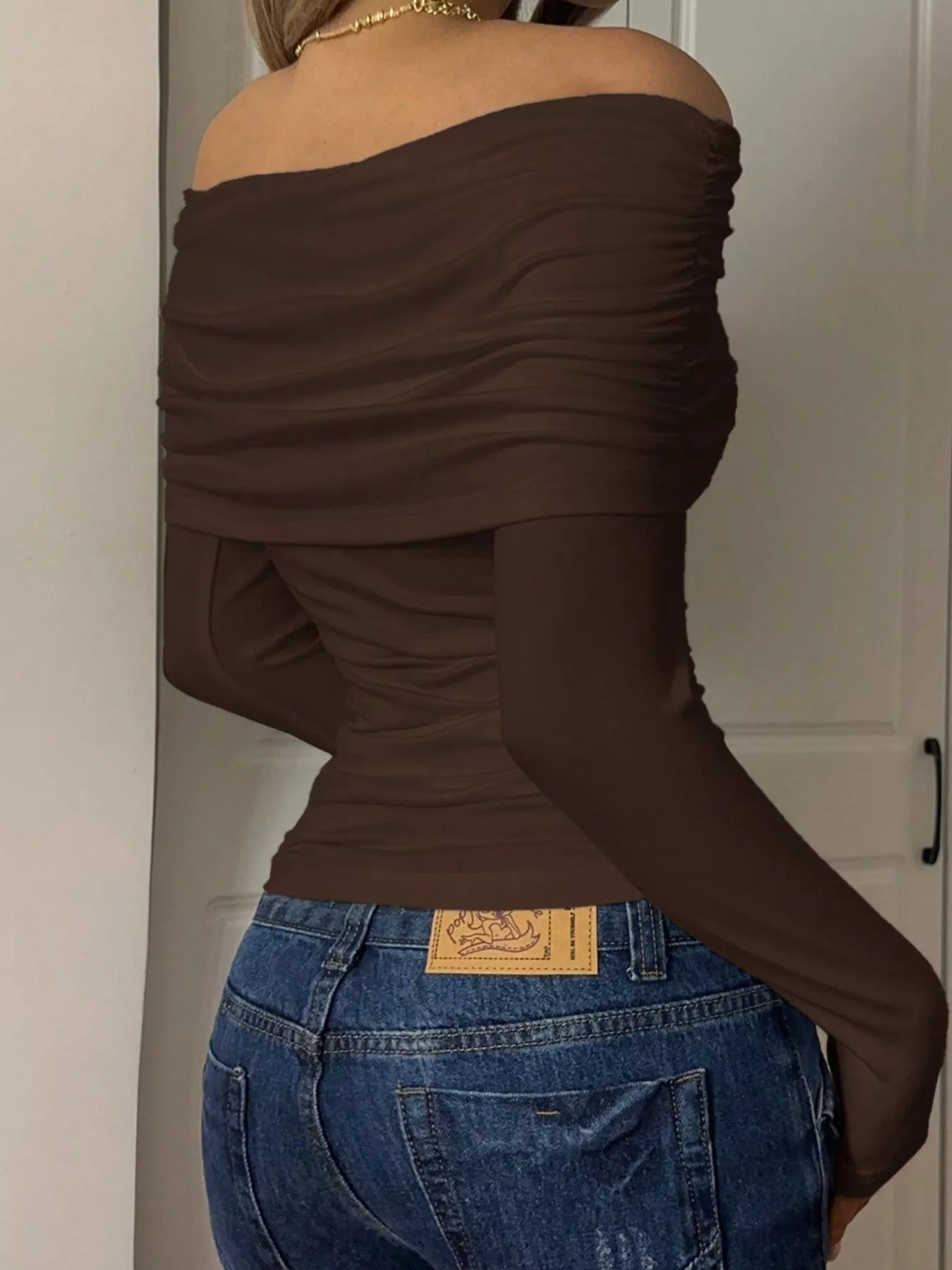 Off-Shoulder Ruched Long Sleeve T-Shirt for Modern Women in brown, showcasing stylish ruched design and fitted sleeves.