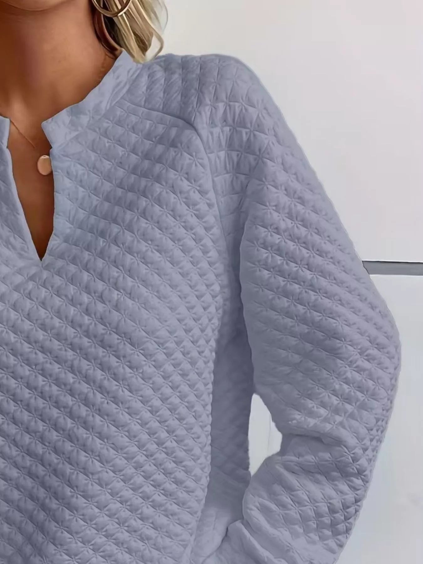Quilted Texture Long Sleeve Sweatshirt with Notched Neck, featuring a stylish notched neck design and soft quilted texture.