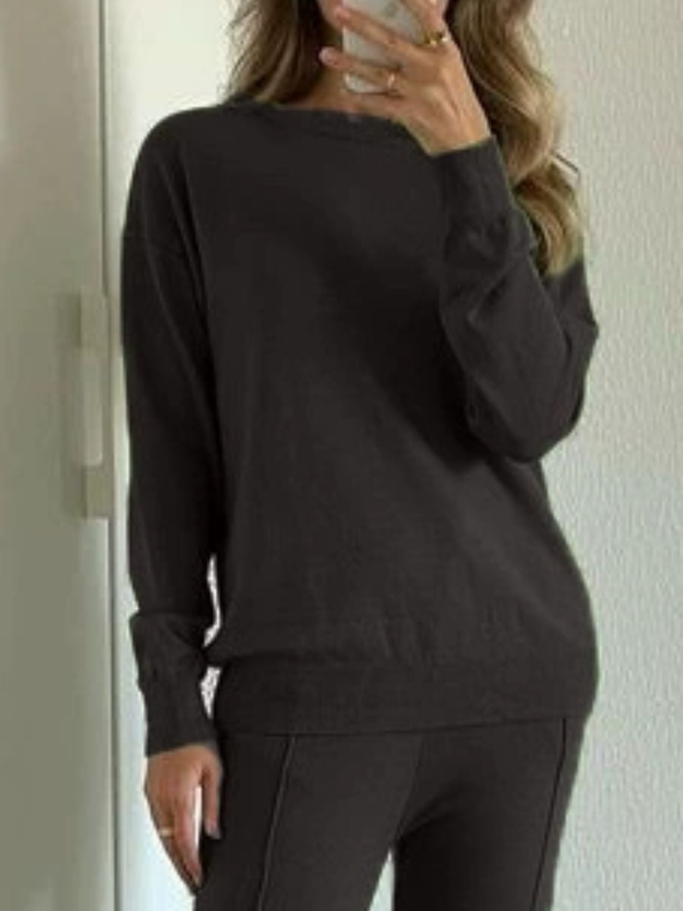Cozy Long Sleeve Top and Pants Sweater Set worn by a woman, featuring a basic style in dark color.