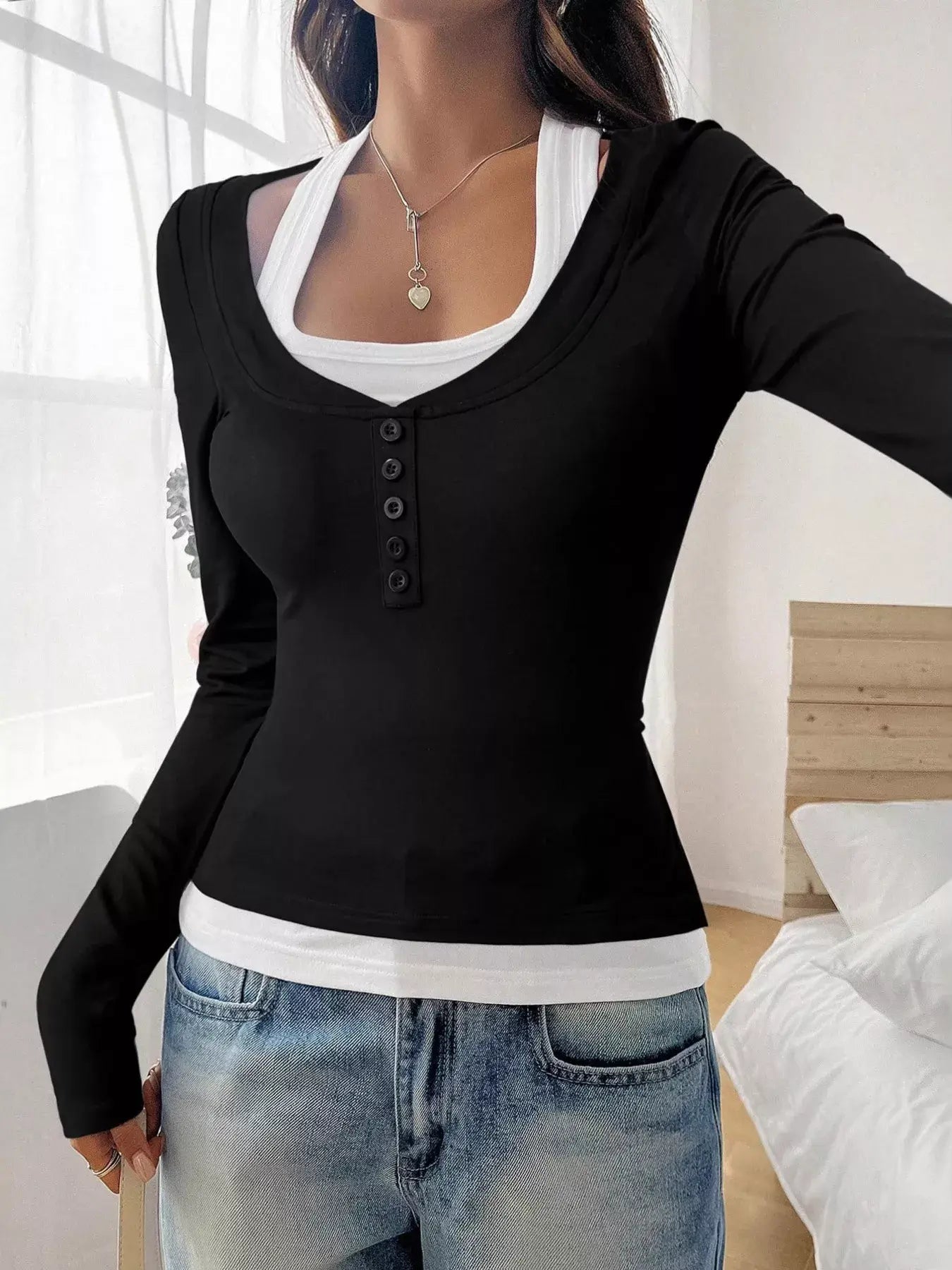 Chic scoop neck long sleeve t-shirt in black, featuring a button-down front and layered look, perfect for casual outfits.