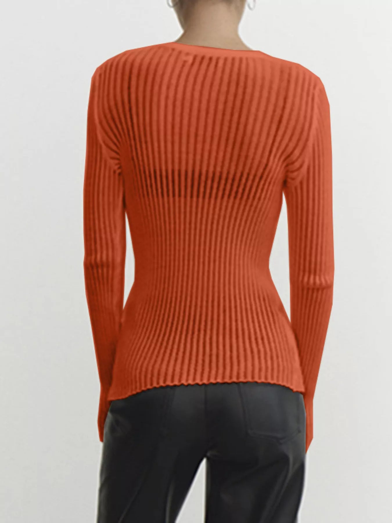 Back view of a Ribbed Knit Long Sleeve Top in orange, featuring a sheer design and a slightly stretchy fit, perfect for everyday wear.