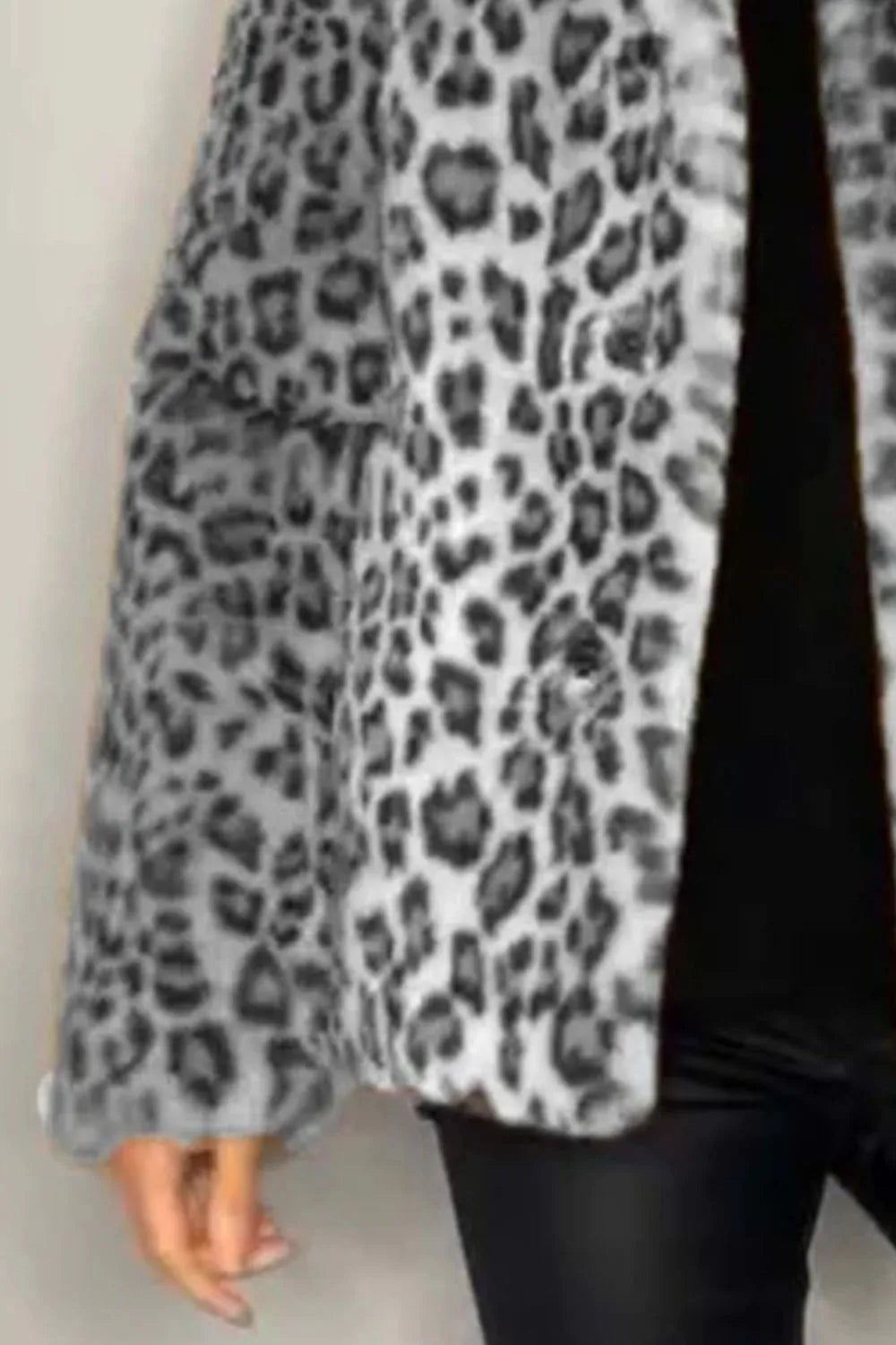 Full Size Leopard Furry Collared Neck Long Sleeve Coat displayed on a model, showcasing its cozy and stylish design.