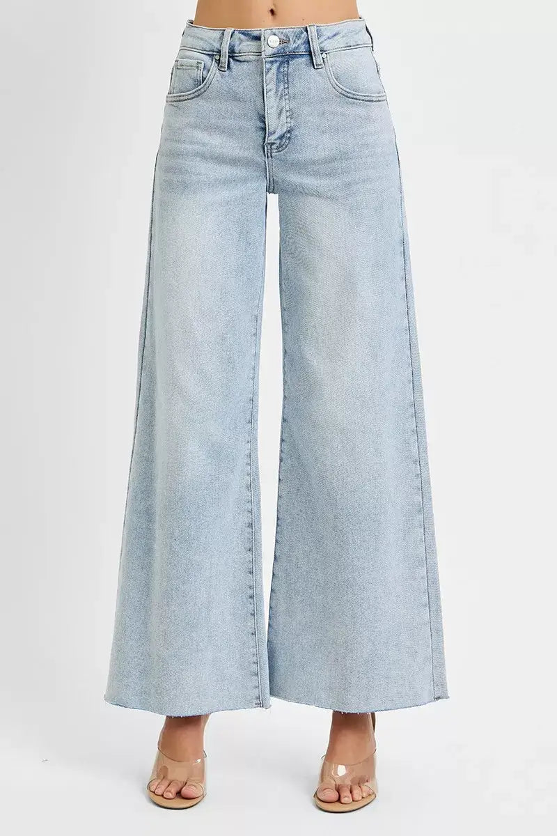 RISEN Full Size High Rise Ankle Wide Palazzo Jeans Plus Size in light blue, featuring wide legs and flattering silhouette.