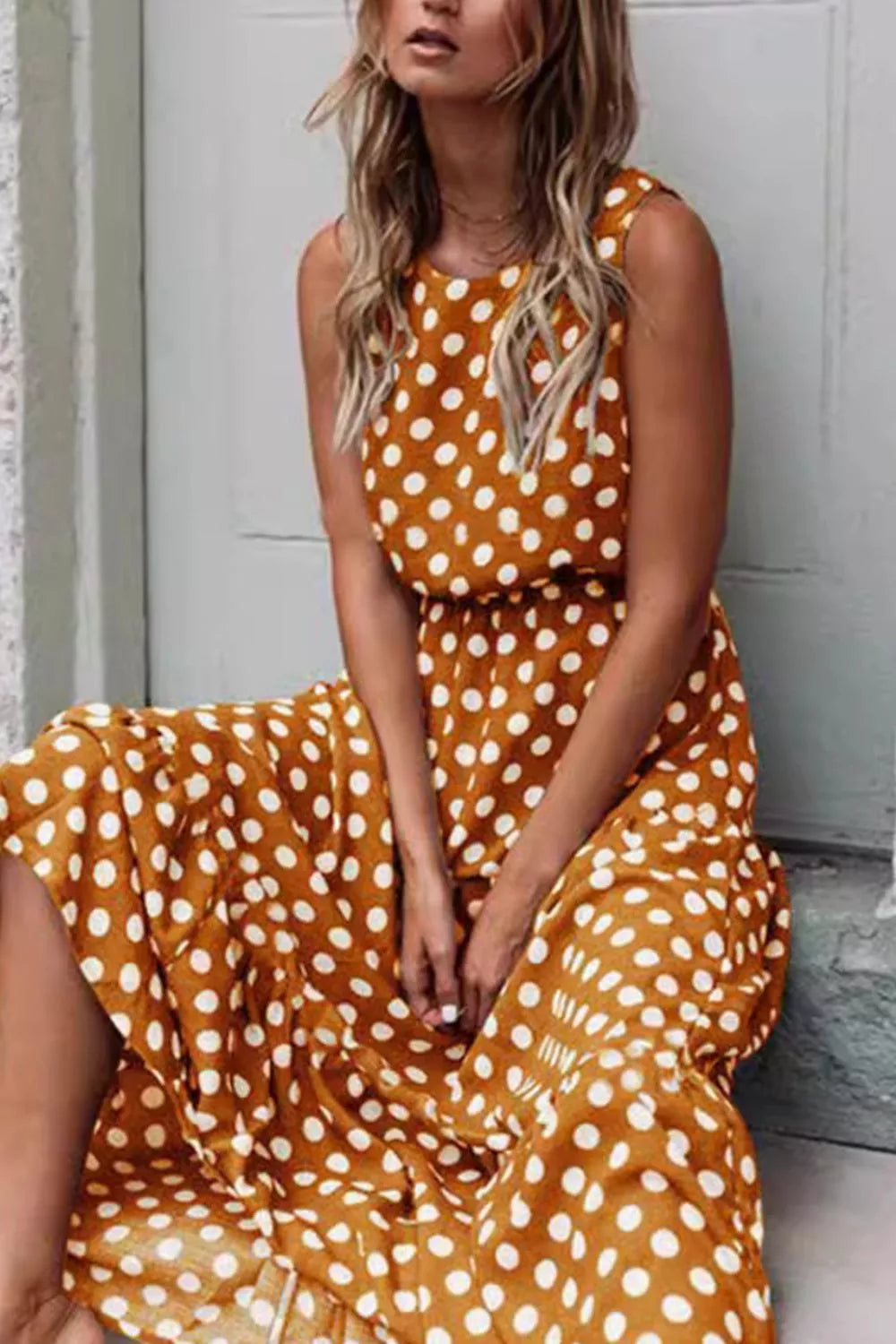 Sleeveless Polka Dot Casual Dress in orange with white dots, perfect for summer outfits and casual wear.