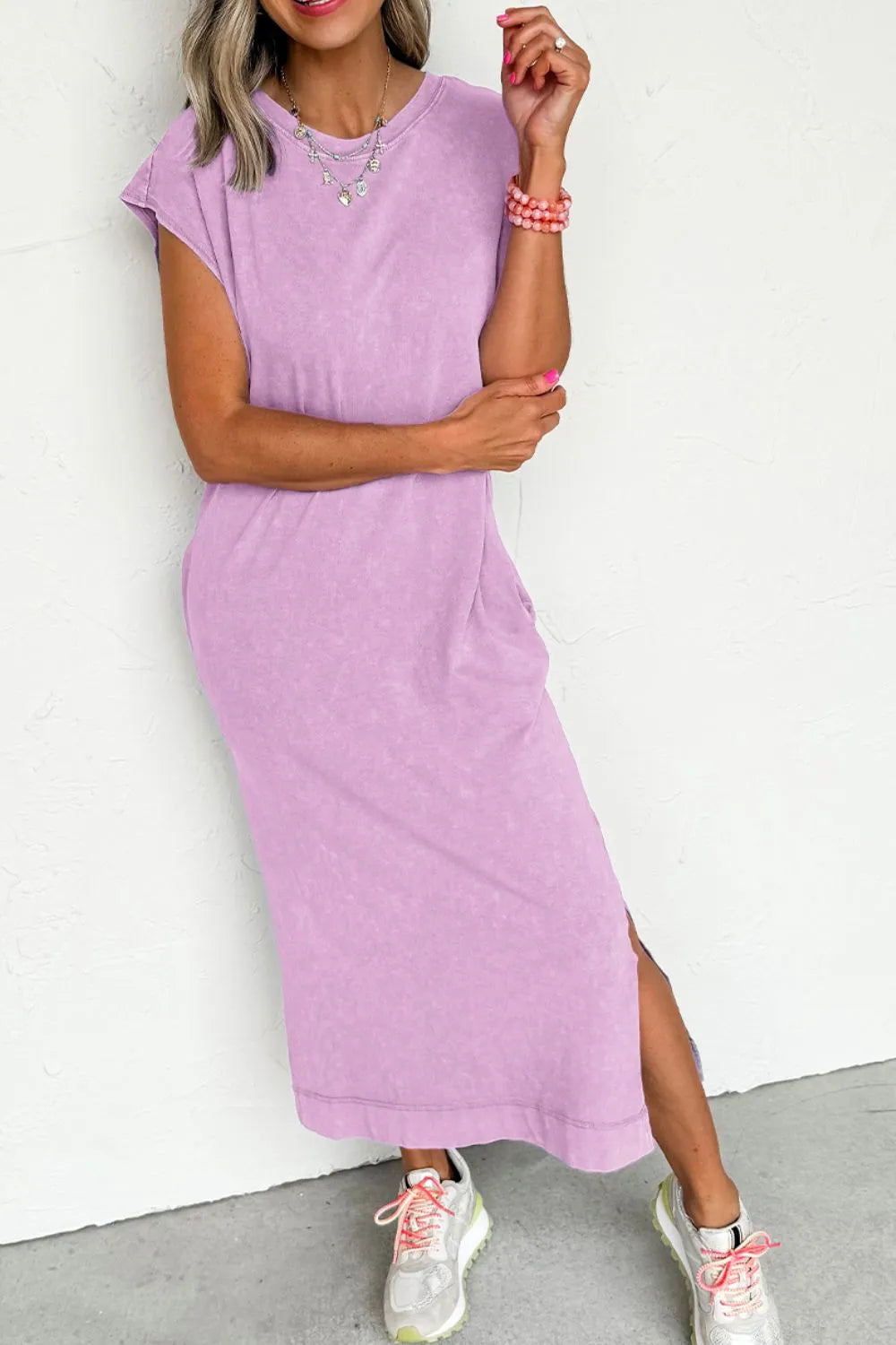 Side Split Round Neck Cap Sleeve T-Shirt Dress for Women in lavender with pockets and slit detail.