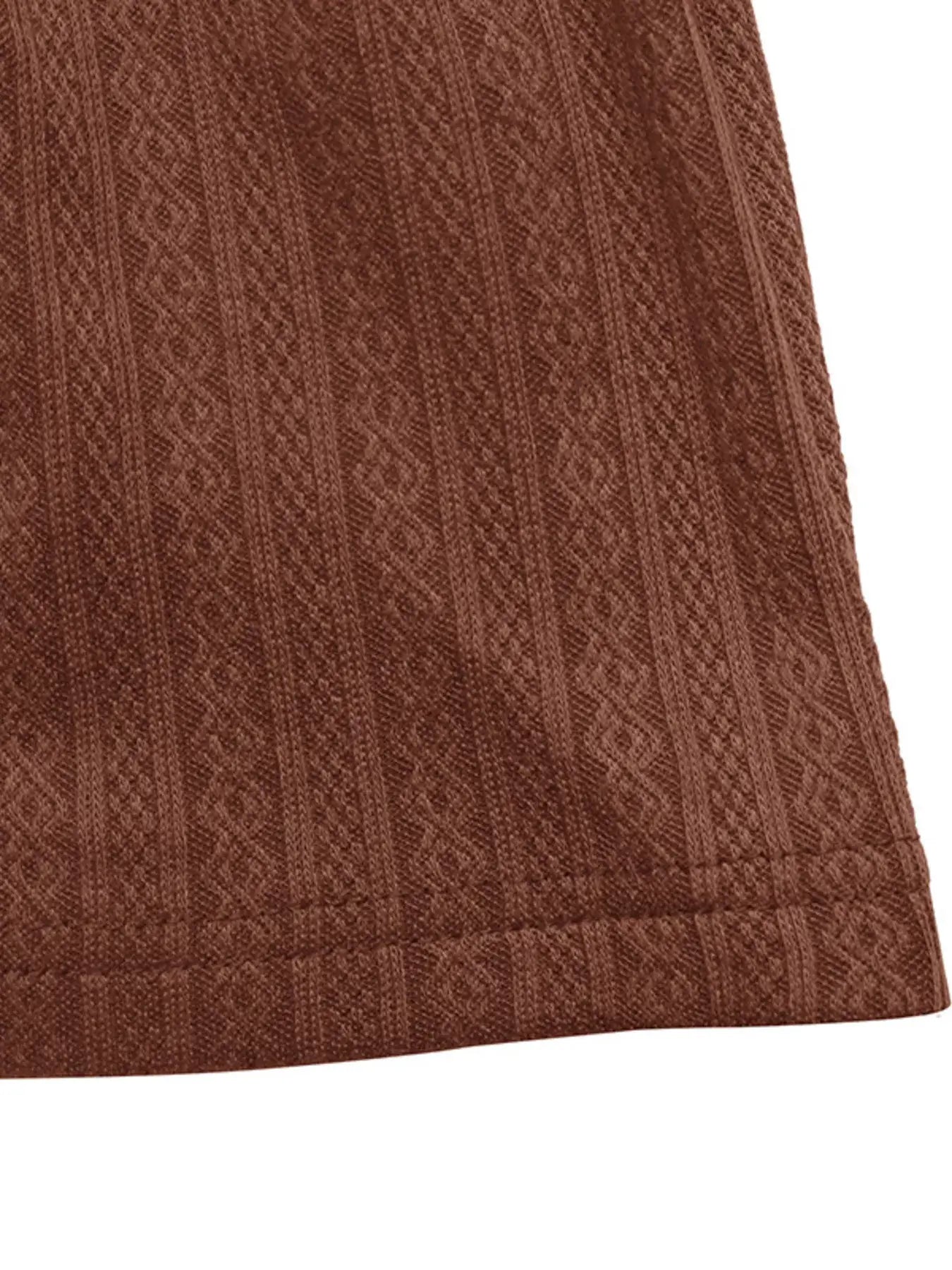 Close-up of the fabric texture of the Ruffled Hem Long Sleeve Knit Dress for Women in rich brown color.