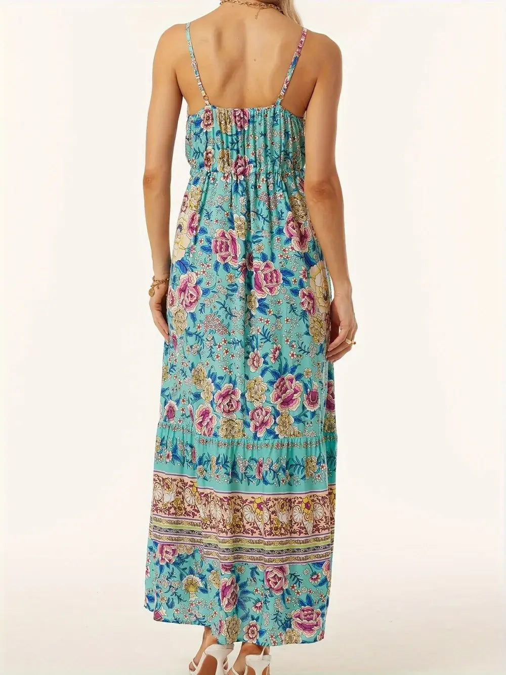 Back view of the Printed Scoop Neck Midi Cami Dress featuring a floral pattern and adjustable straps.