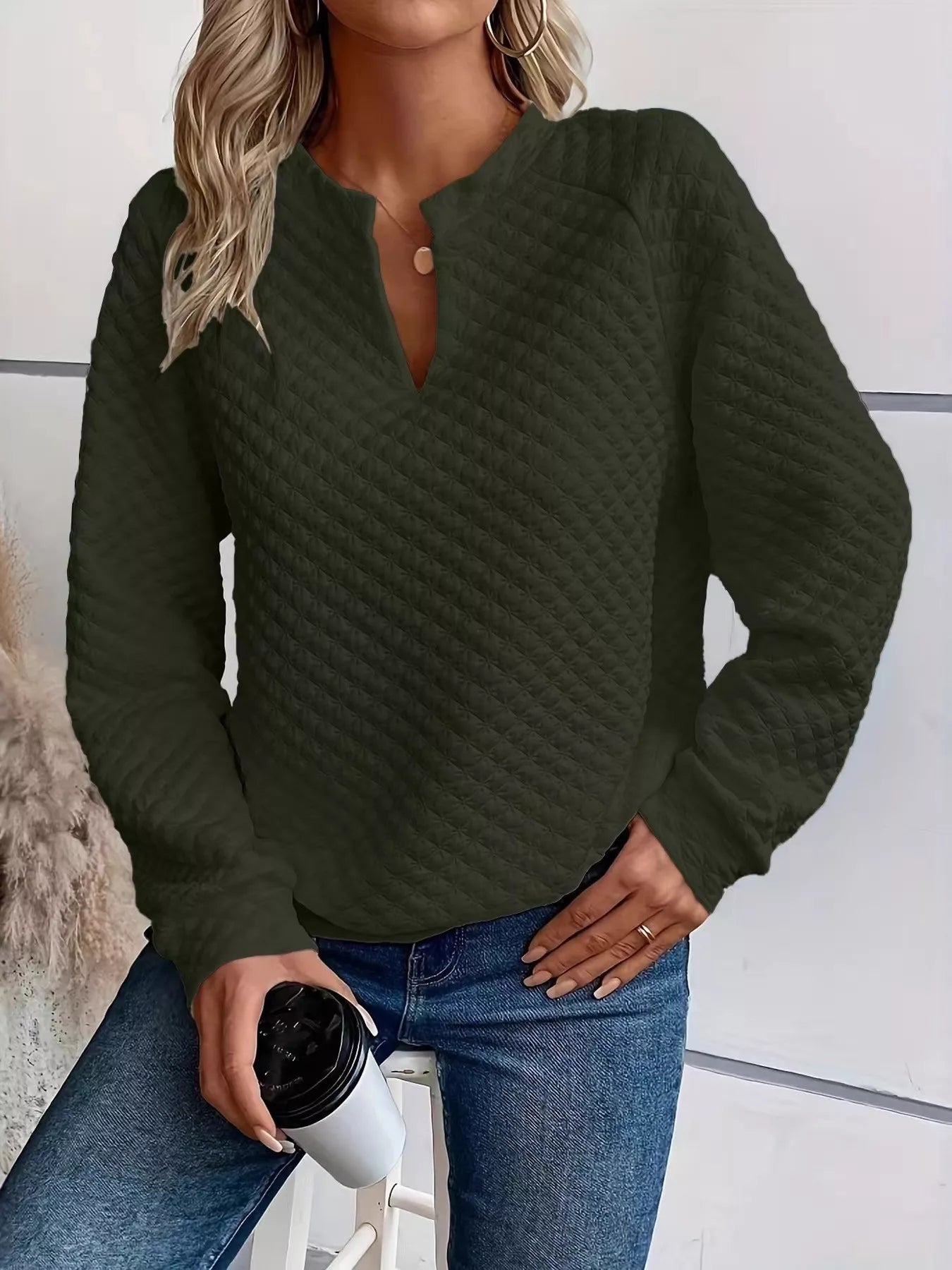 Quilted Texture Long Sleeve Sweatshirt with Notched Neck worn by a woman, featuring a trendy design and slightly stretchy fabric.
