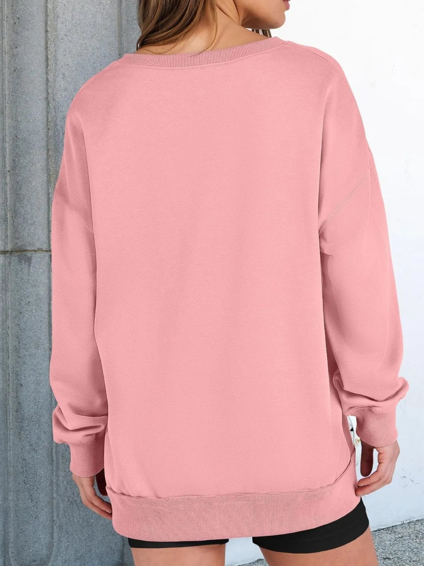 Notched Long Sleeve Oversized Sweatshirt in pink, showcasing the back view and comfortable fit for casual wear.