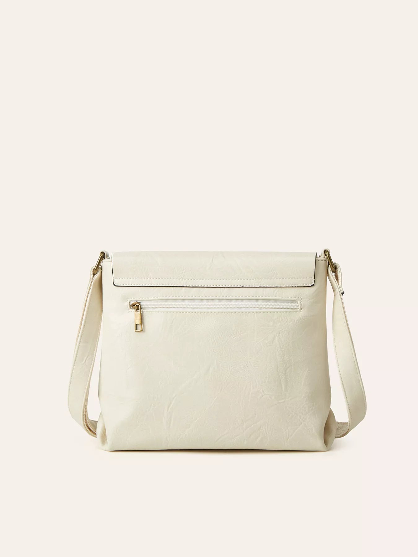 Vintage Buckle Flap Crossbody Bag in cream PU leather with adjustable strap and zipper pocket.