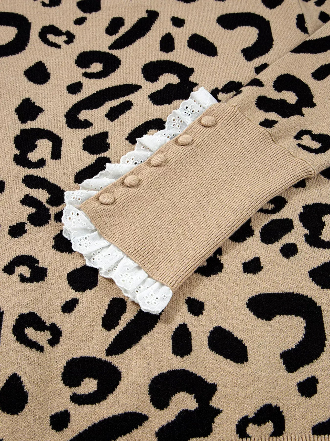 Leopard Pattern Lace Ribbed Detail Button Top showcasing lace-trimmed ribbed sleeve detail on a bold leopard print background.