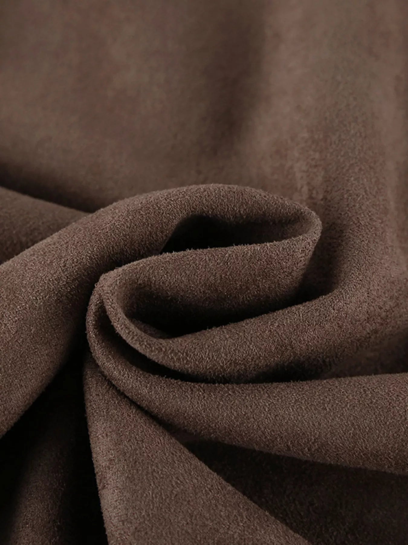 Close-up of soft brown fabric showcasing the material texture for the Zip-Up Dropped Shoulder Jacket.