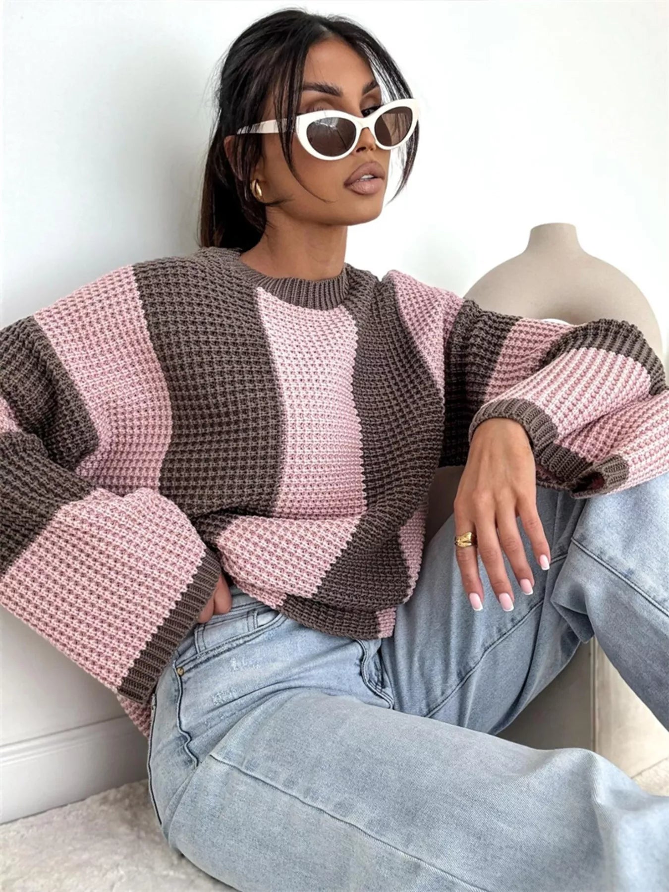 Color Block Long Sleeve Sweater worn by a model with oversized sunglasses, showcasing cozy knit style in pink and brown.