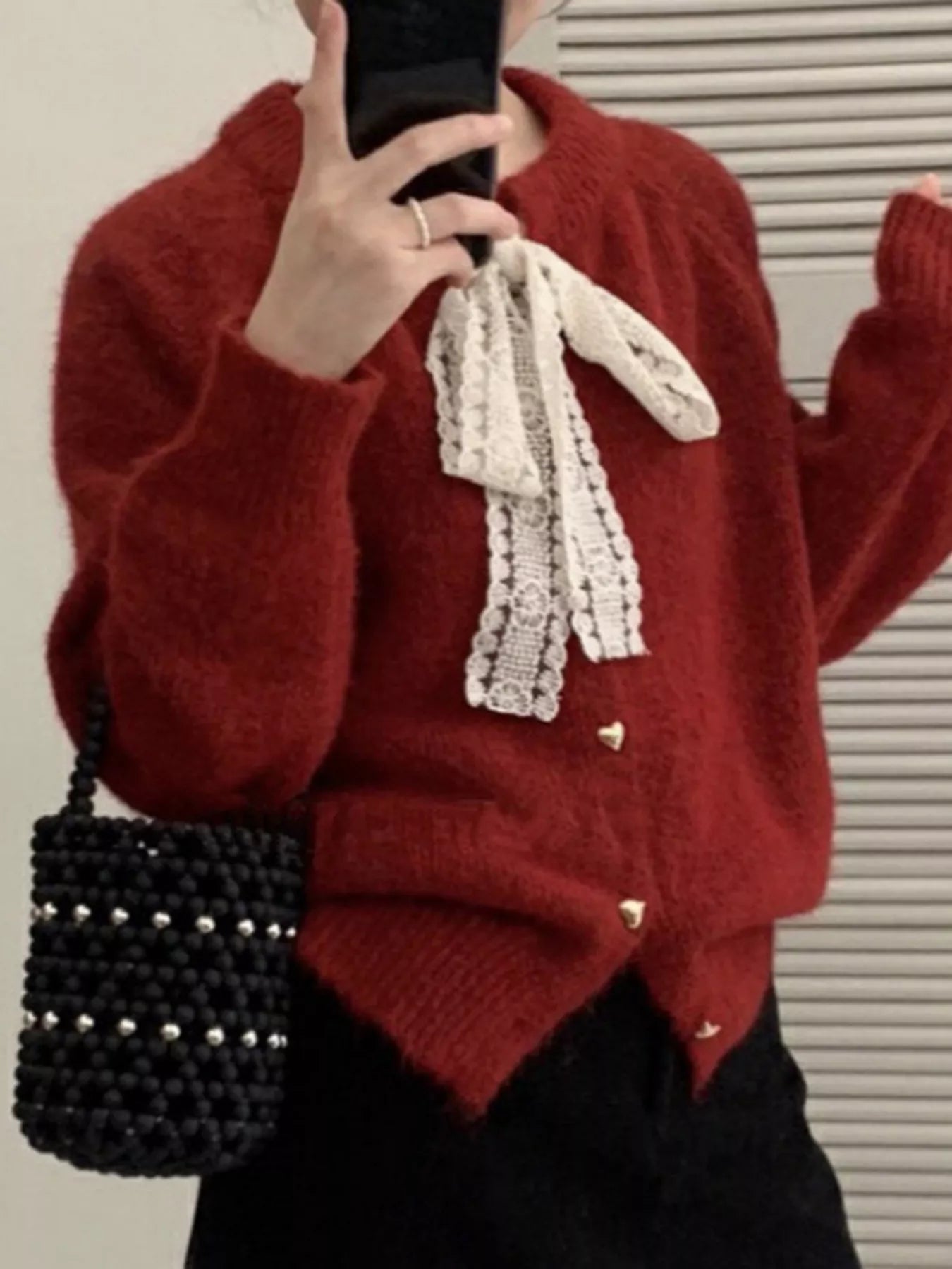 Lace Bowknot Knit Cardigan in red with lace bow and buttoned details, perfect for feminine everyday style.