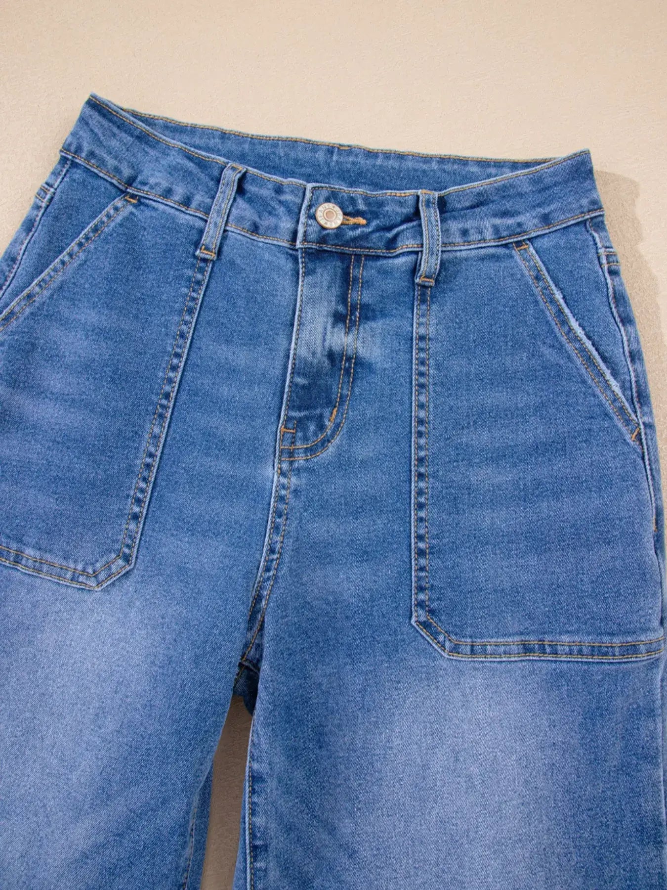High-Waisted Wide Leg Flare Jeans showcasing a flattering high-rise waist and vintage-inspired charm.