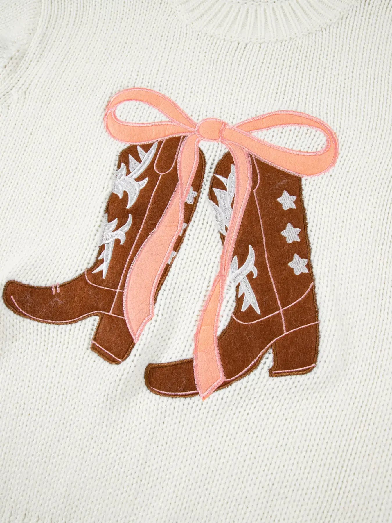 Embroidered bow boots graphic drop shoulder sweater featuring playful boots and bows design on cozy knit fabric.